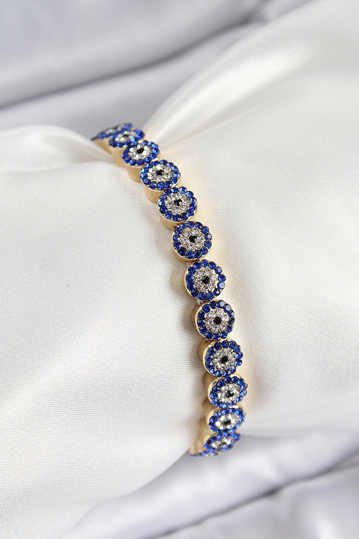 Pirinç Zirkon Taşlı Lacivert Nazar Model Gold Renk Lastikli Kadın Bileklik