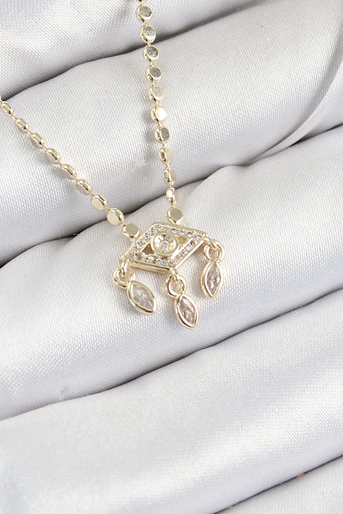 Pirinç Zirkon Taşlı Sallantılı Göz Model Ezme Zincir Gold Renk Kadın Kolye