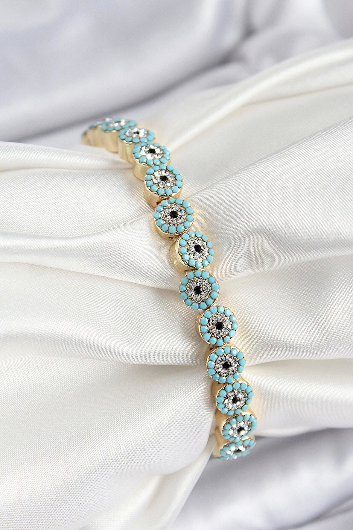 Pirinç Zirkon Taşlı Turkuaz Nazar Model Gold Renk Lastikli Kadın Bileklik
