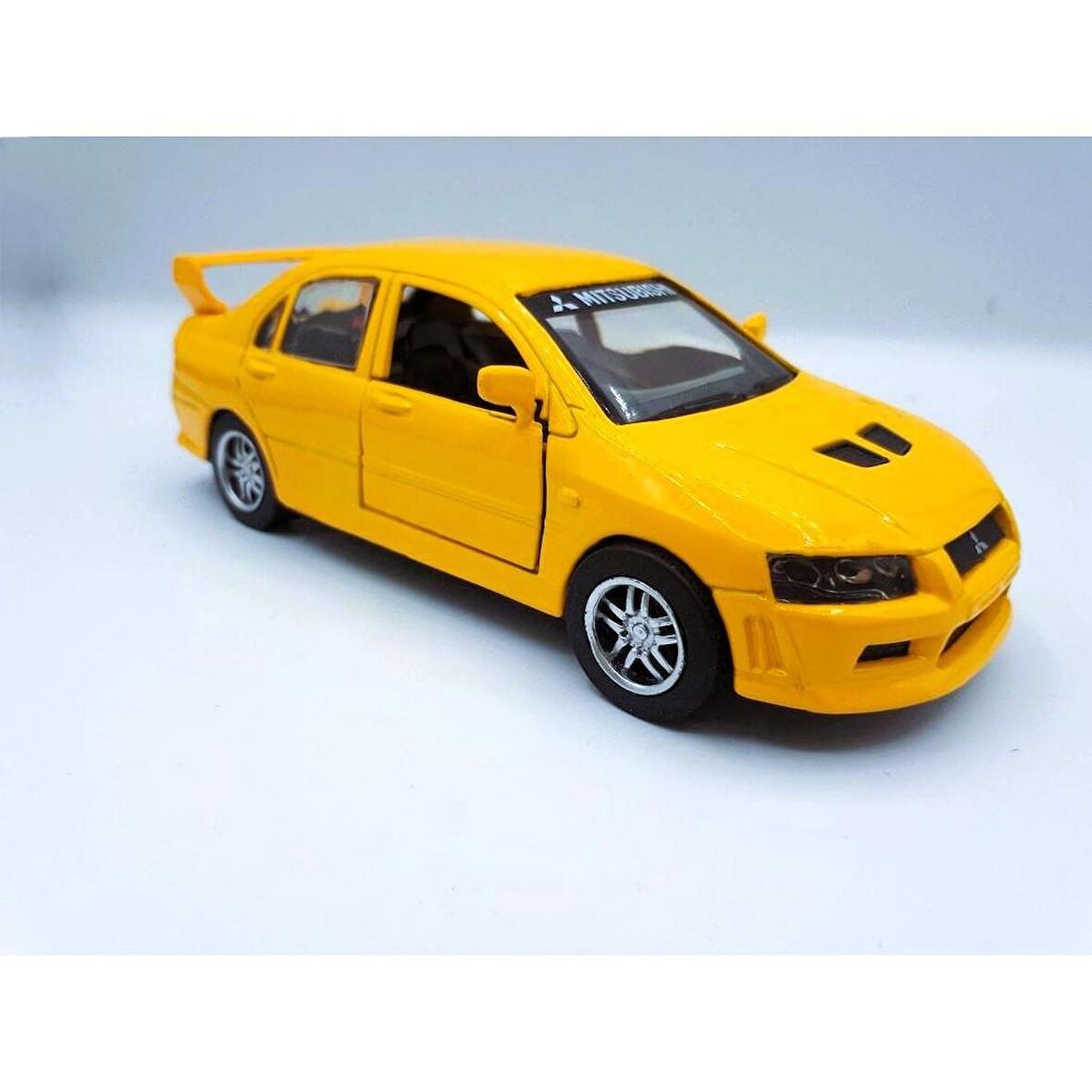 1:32 New Ray MITSUBISHI LANCER EVOLUTION VII Metal Kapıları Açılır 13 cm. Model Araba