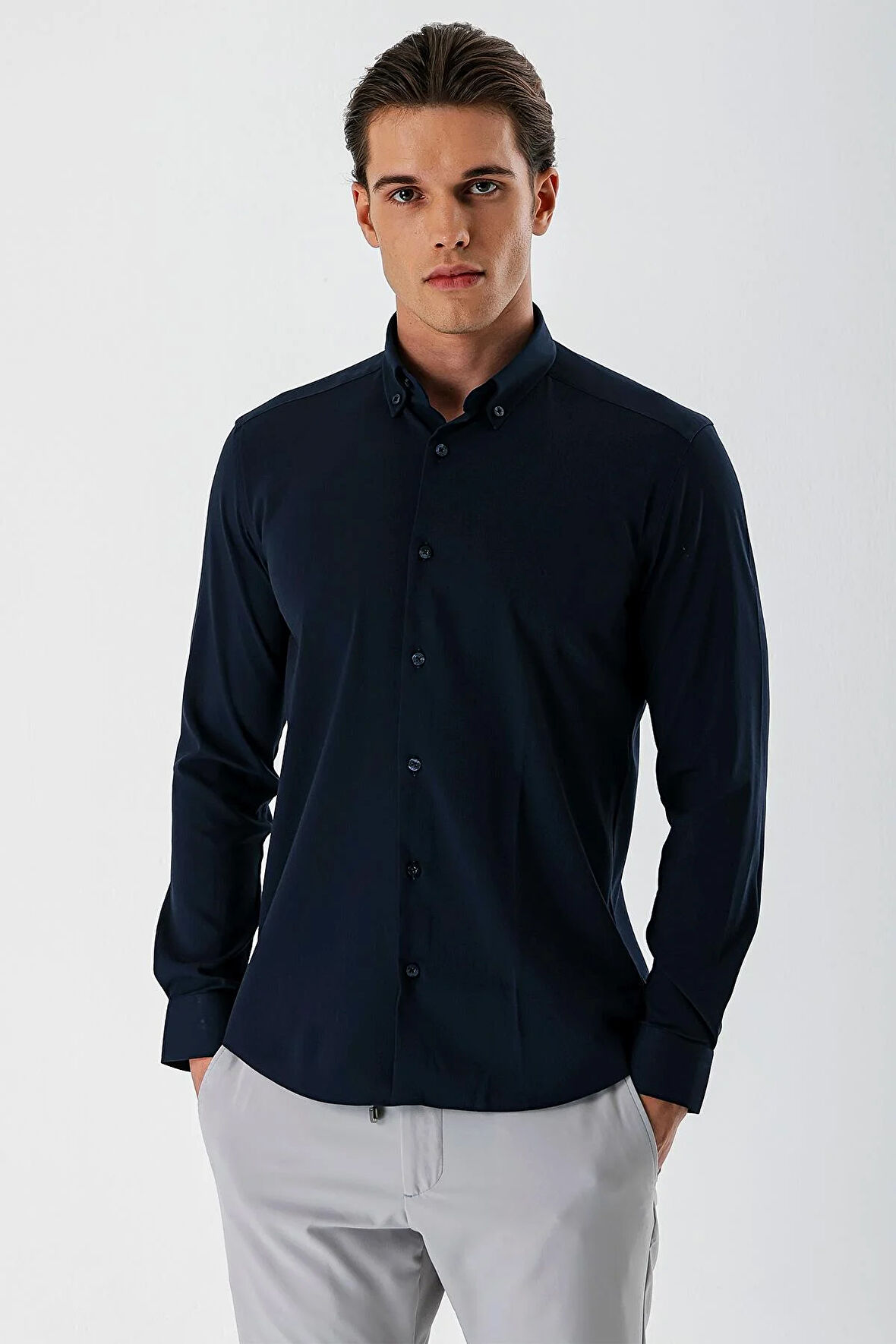 Koyu Lacivert Uzun Kollu Bez Ayağı Düğmeli Yaka Cepsiz Pamuklu Likralı Slim Fit Gömlek 1004240176