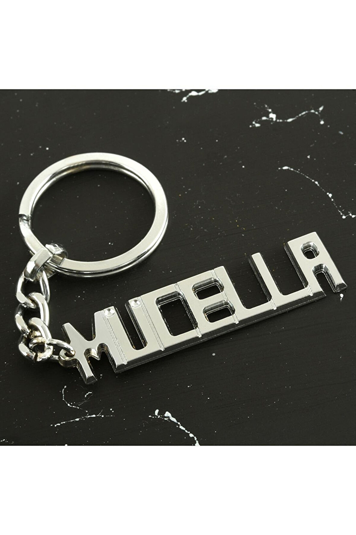 Mücella İsimli Anahtarlık