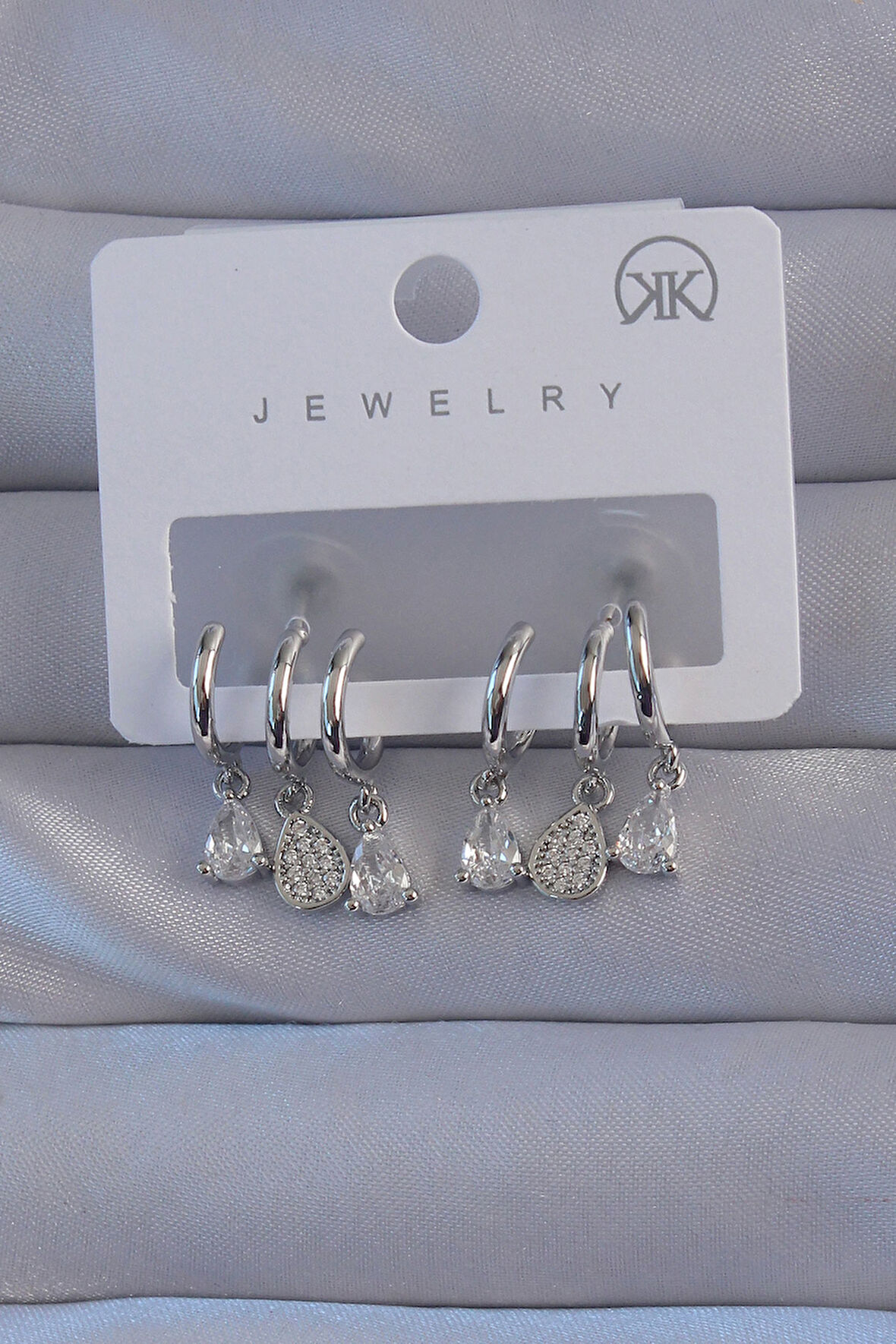  Pirinç Gümüş Renk Zirkon Taşlı Damla Model Çoklu Görünüm Yarım Halka Küpe