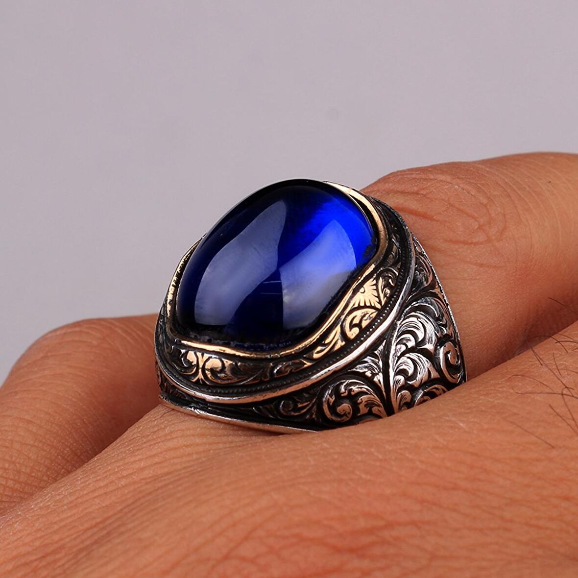 KALEM İŞLEME MOTİFLİ OVAL MODEL ZİRKON TAŞLI GÜMÜŞ YÜZÜK