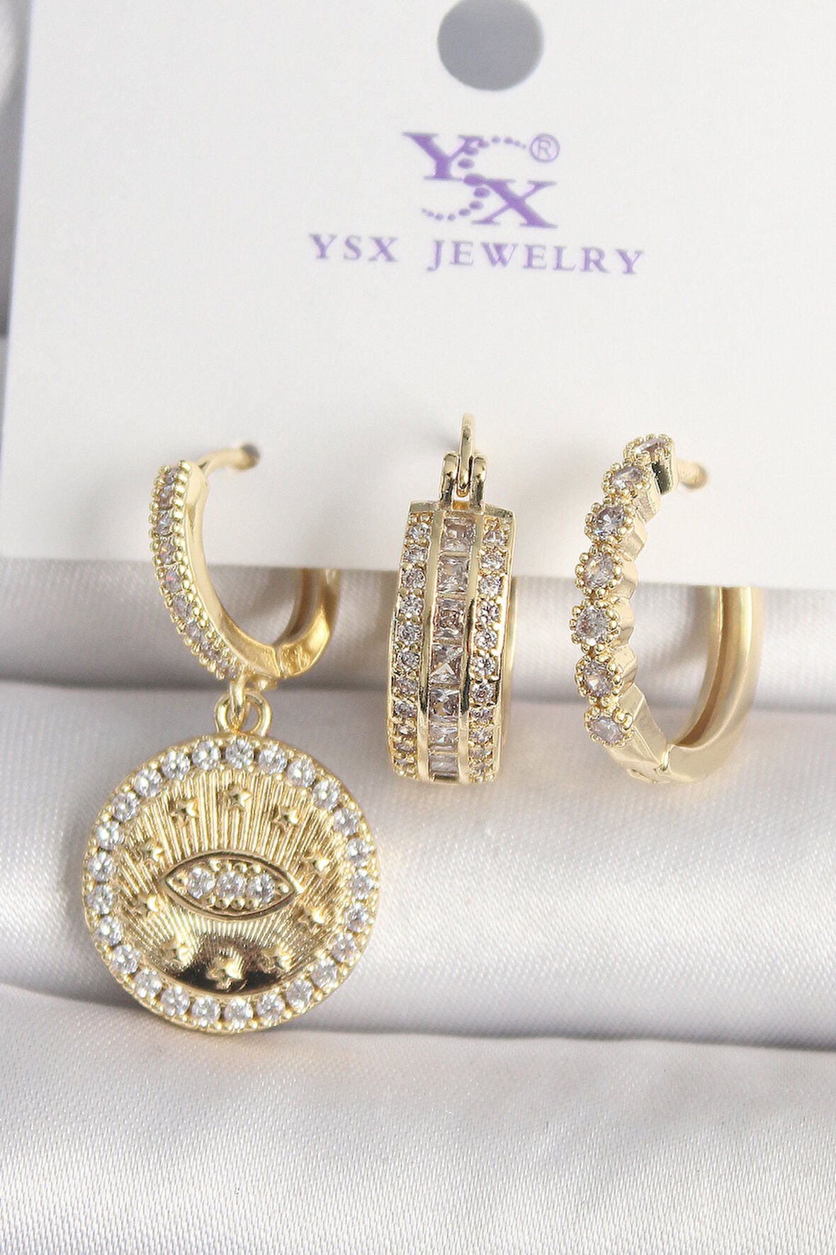 Pirinç Gold Renk Zirkon Taşlı Göz İşlemeli Model  3'Lü Kadın Kombin Küpe