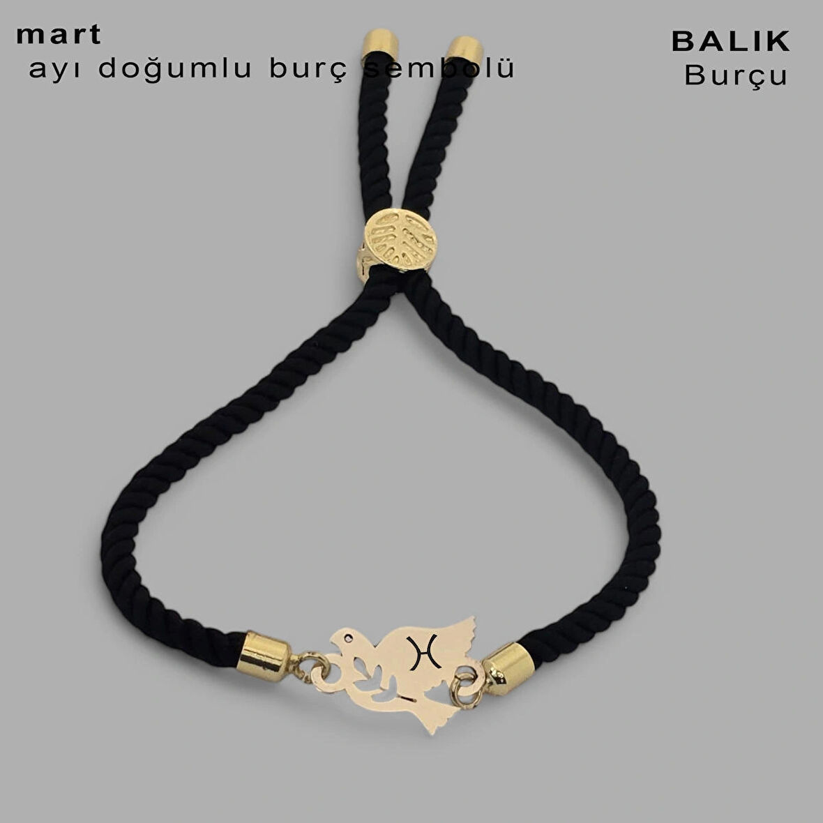 Canlandırıcı Dokunuşuyla Kuş Motifli Siyah Örgülü ve 14 Ayar Altın Plakalı Mart Bilekliği