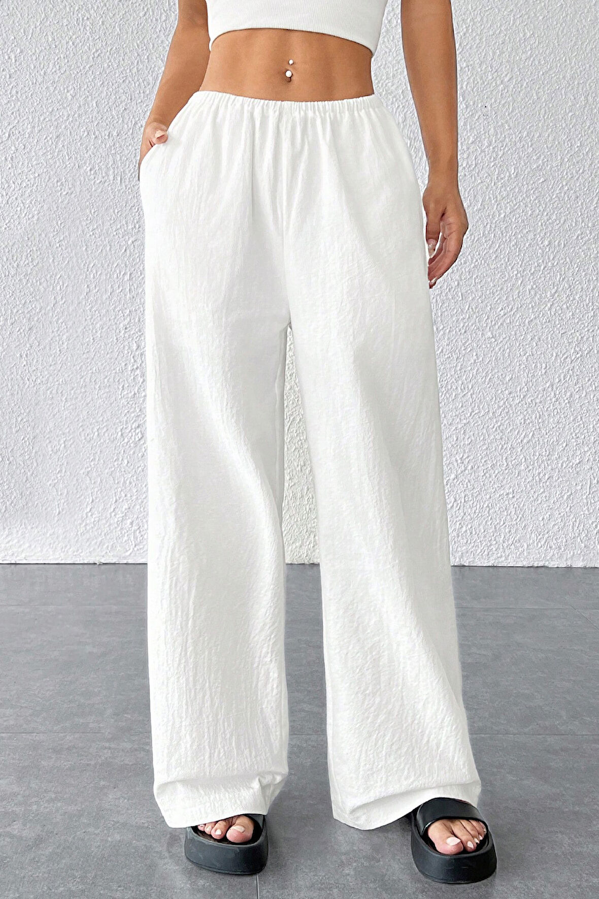 Dodes Kadın Beyaz Bol Kesim Cepli Geniş Paça Dökümlü Pantolon