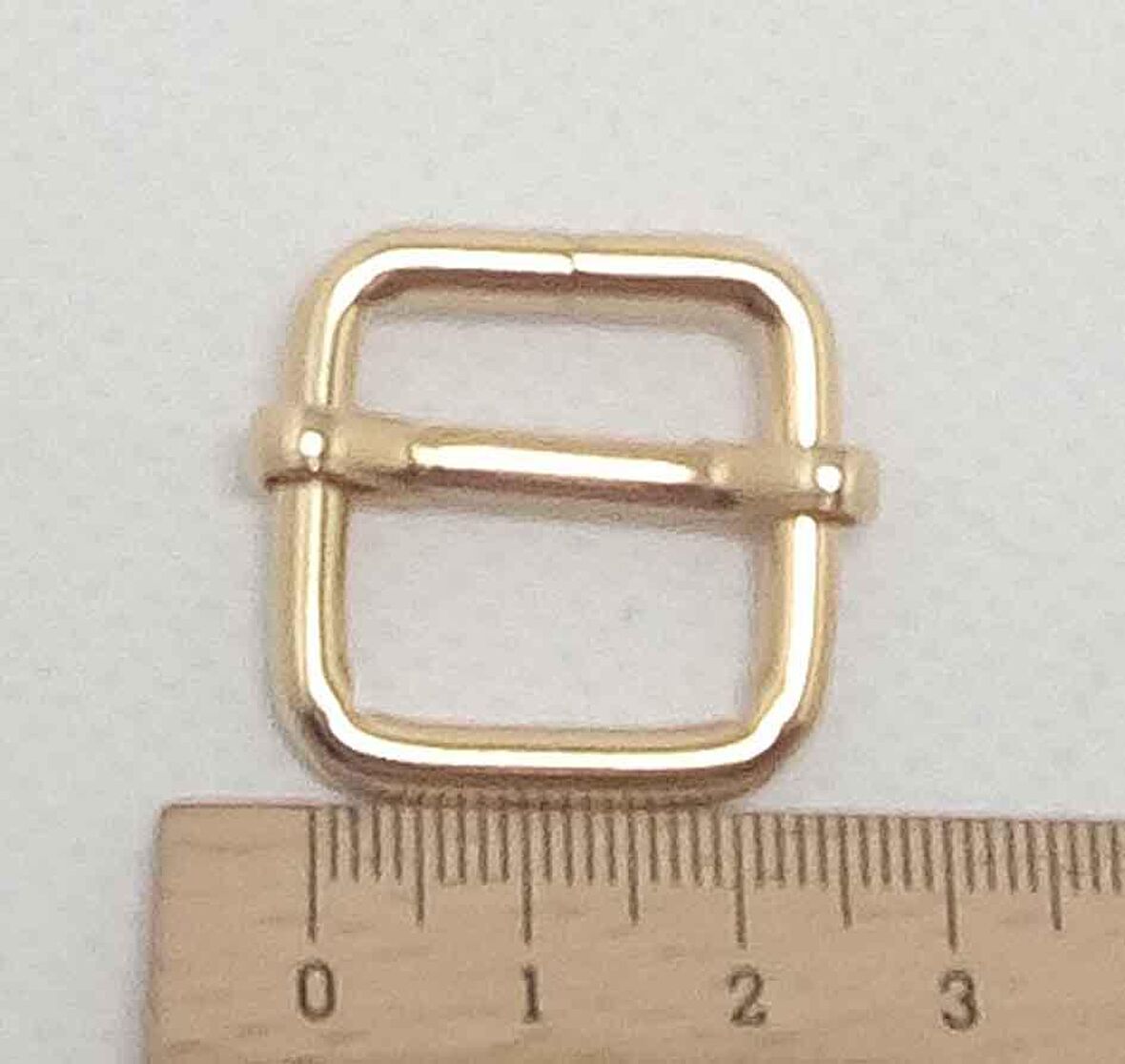 Light gold renk 2x2  cm ayarlama aparatı .