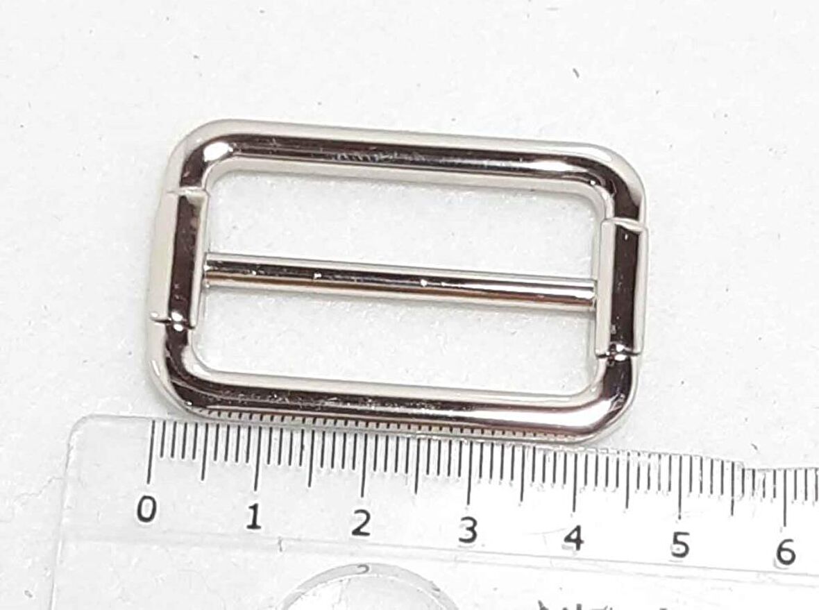 Gümüş renk  4x2  cm ayarlama aparatı .