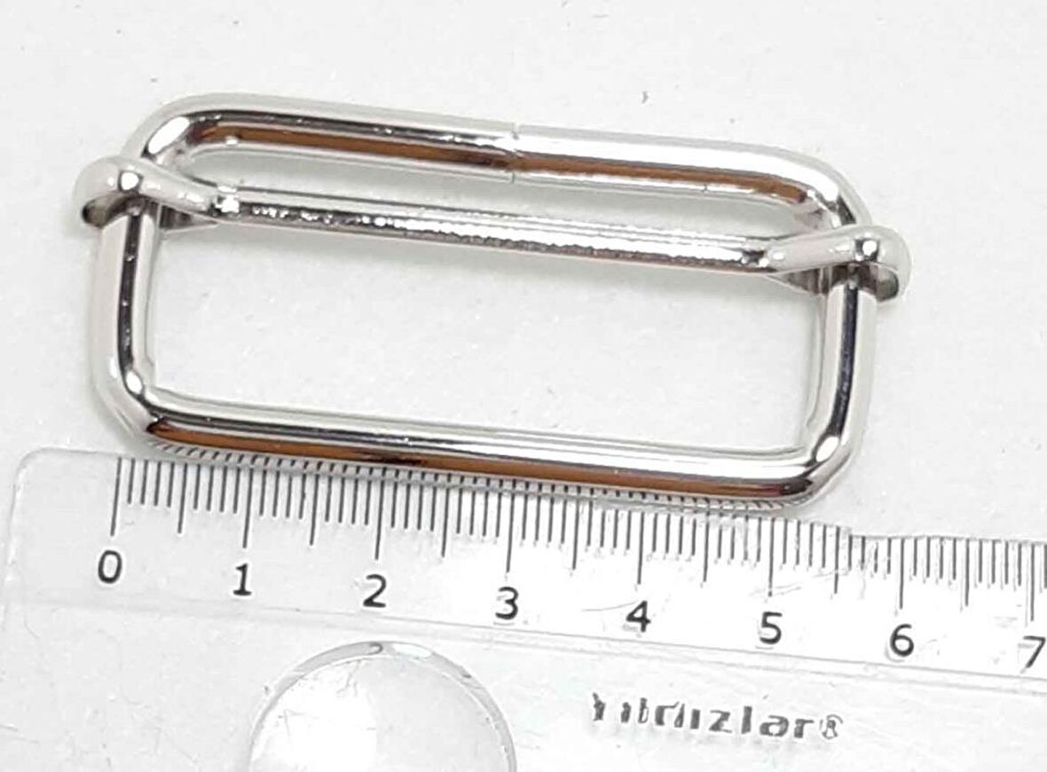 Gümüş renk 5x2  cm ayarlama aparatı .
