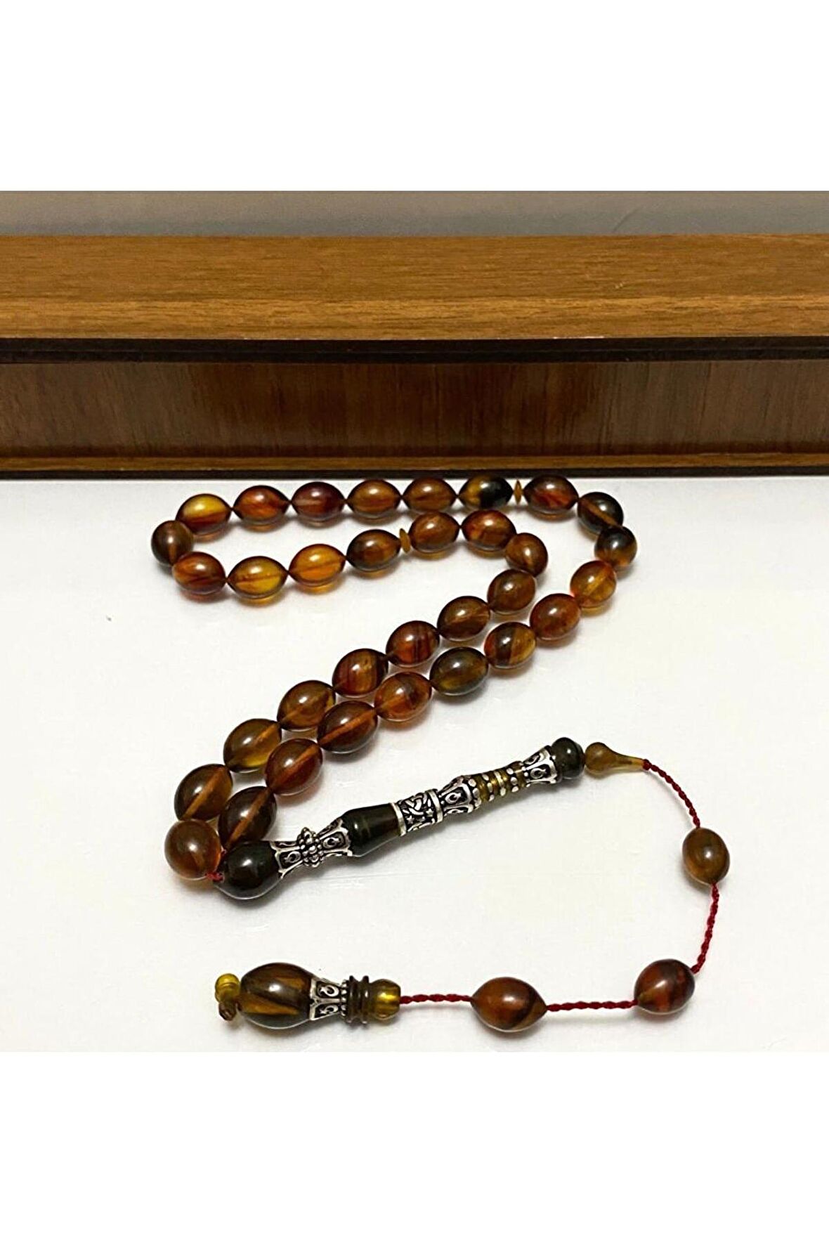 Usta İşçilikli Alacalı Renk Nakkaş Imameli Sıkma Kehribar Tesbih