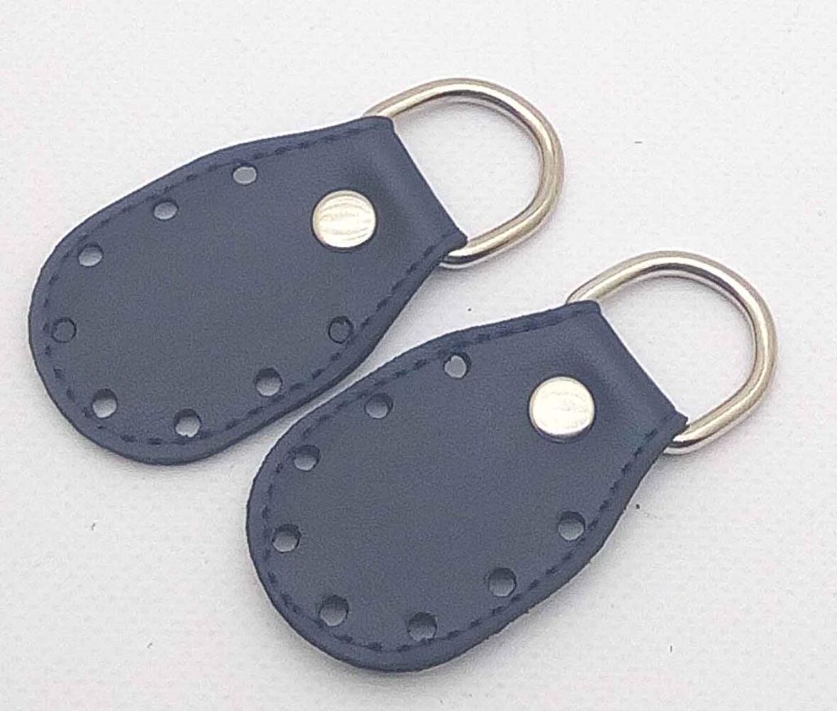 Lacivert renk, sapların uç kısmına dikmek için deri aparat.