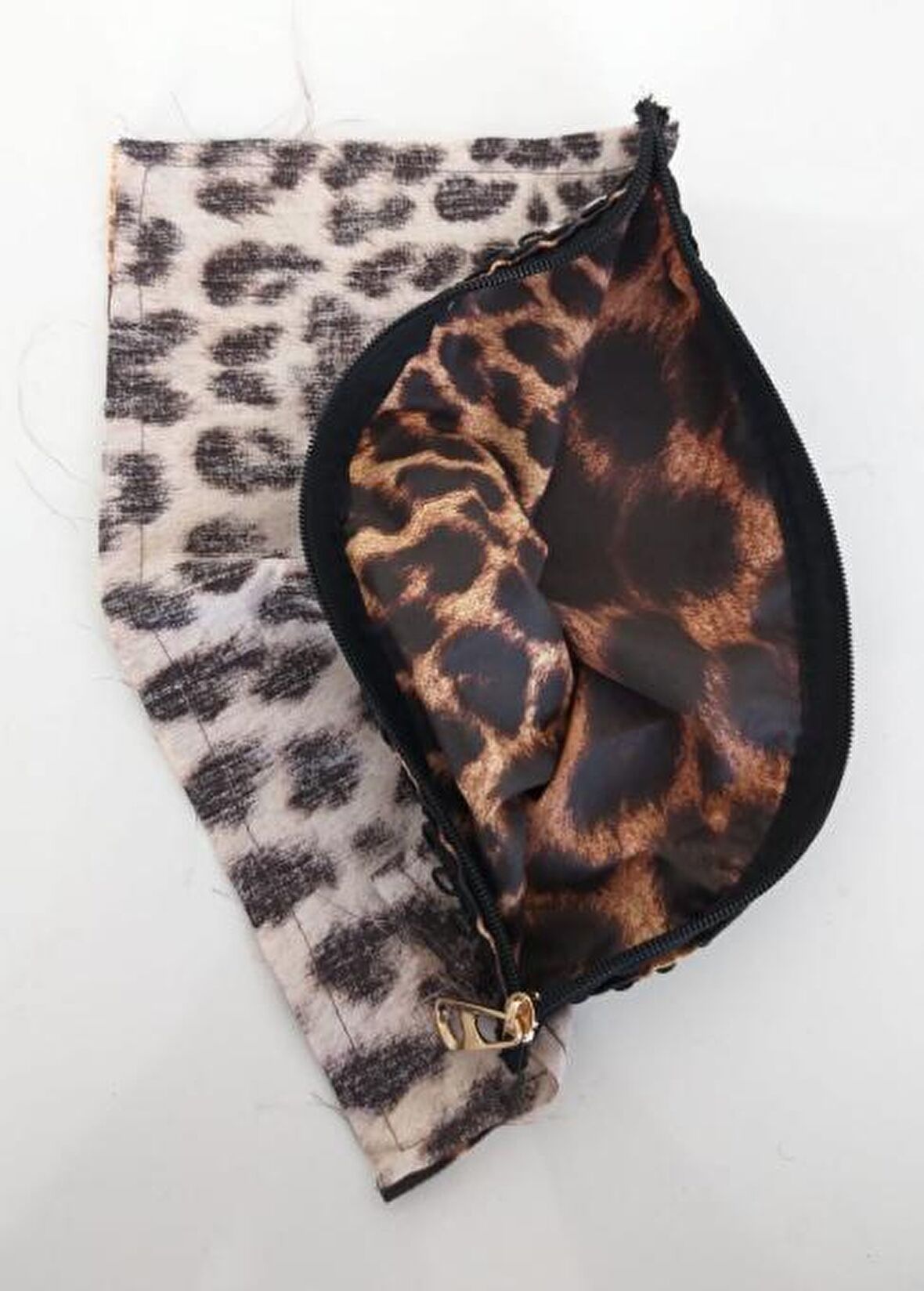 20x30 cm, dikilmiş halde, fermuarlı  astar leopar