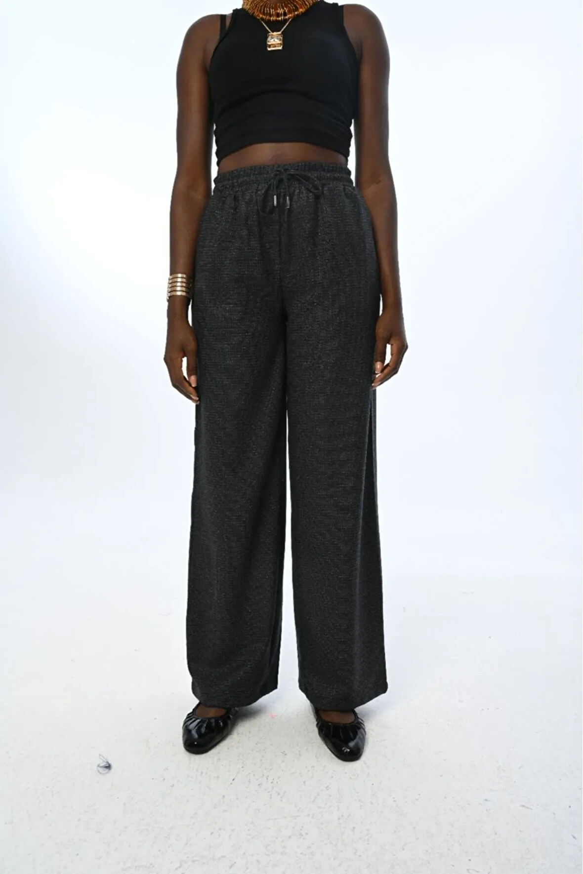 KADIN BELİ LASTİKLİ BOL PAÇA SİMLİ DÜZ RENK PANTOLON