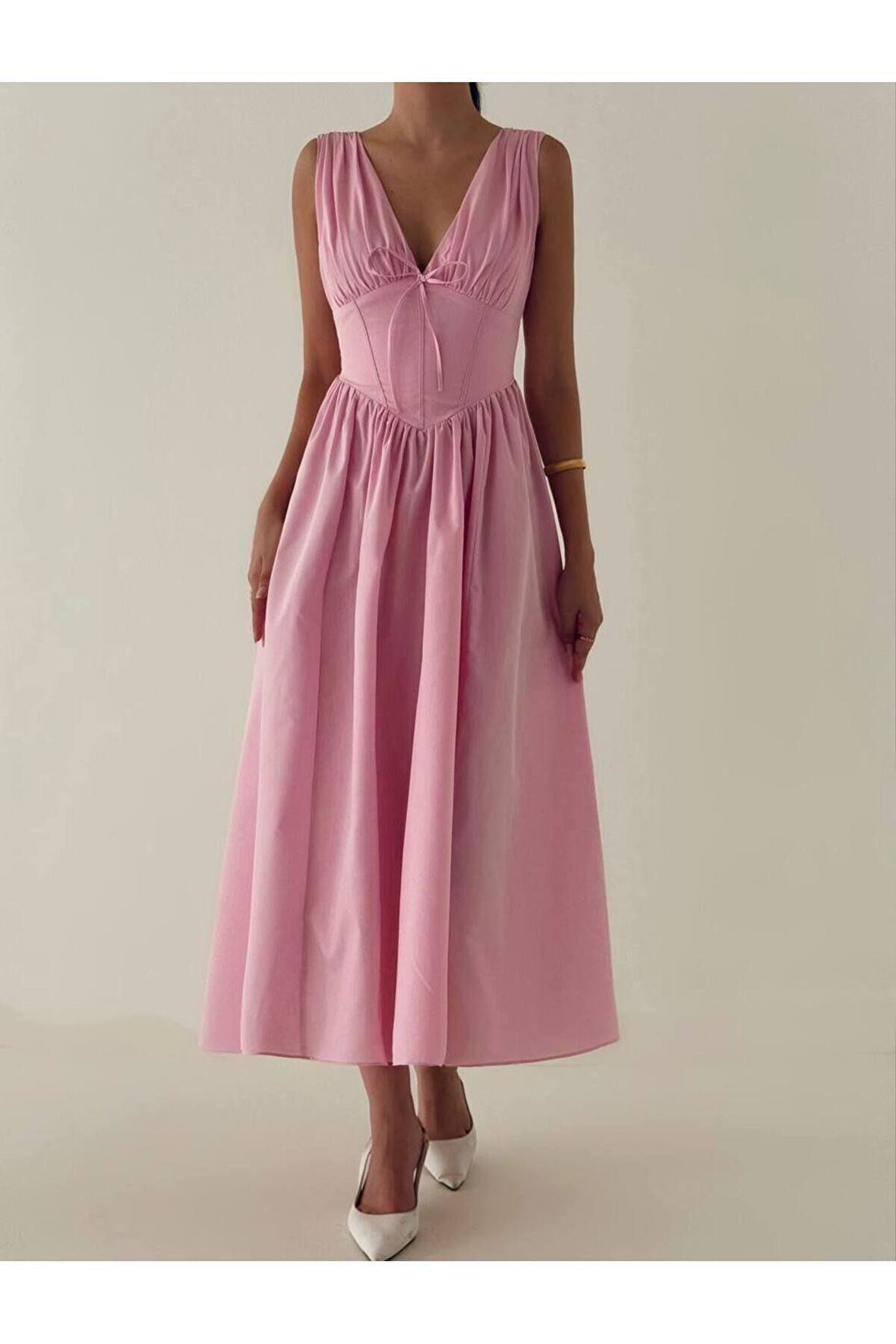 Büzgülü bel detaylı terikoton elbise