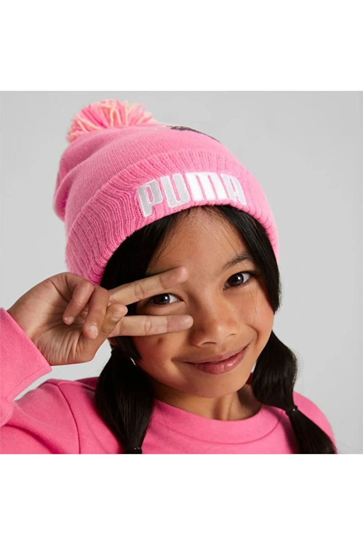 Small World Pom Beanie