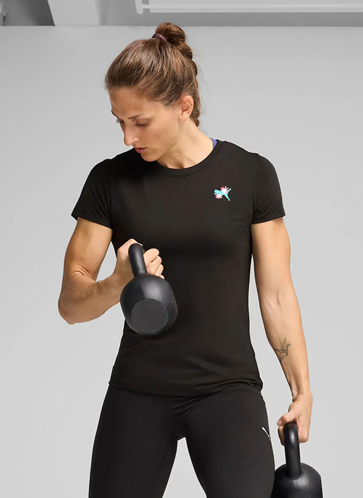 Puma 52655917 GRAPHICS TRAIN CONCEPT TEE Siyah Yuvarlak Yaka Regular Fit Düz Kadın T-Shirt