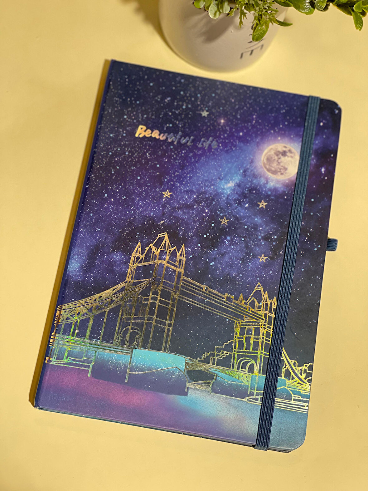 Dolunay Hologramlı Sert Kapak Lastikli Çizgili Defter 14 x20cm 80 Yaprak