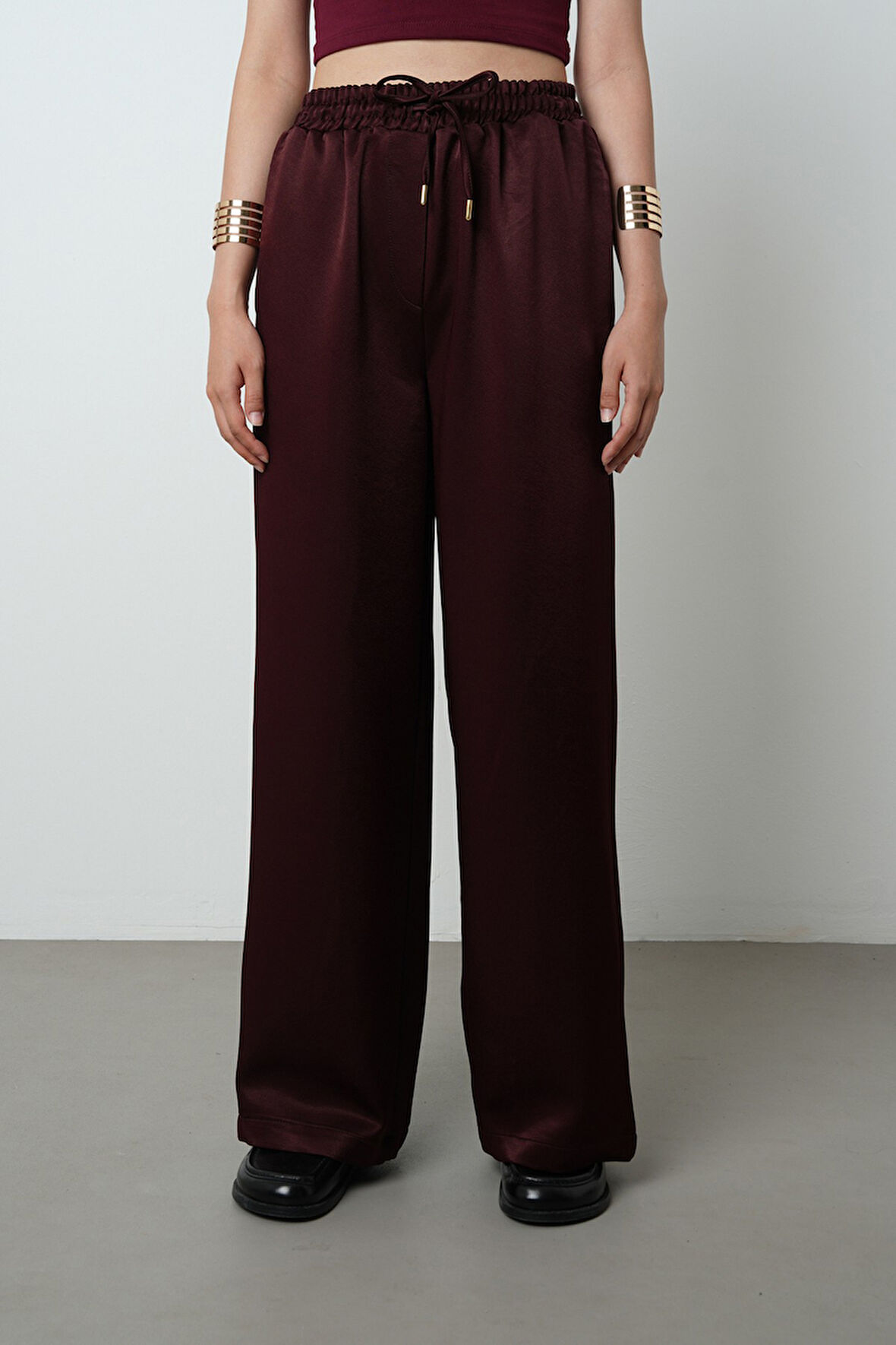 Kadın Düz Renk Parlak Kumaş Bol Paça Beli Lastikli Pantolon