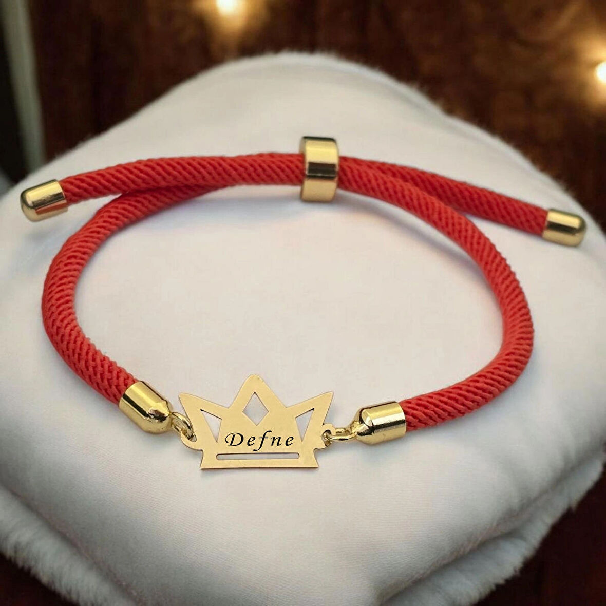 Defne İsmine Özel Taç Motifli 14 Ayar Altın Plakalı Turuncu İpek Örgülü Hediye Bileklik-501isim