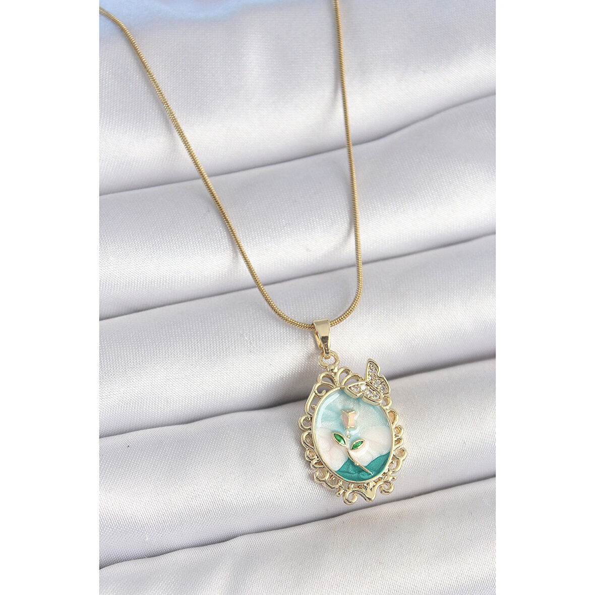 316L Çelik Gold Renk Zincir Mavi Mineli Çiçek İşlemeli Zirkon Taş Detaylı Portre Model Kadın Kolye