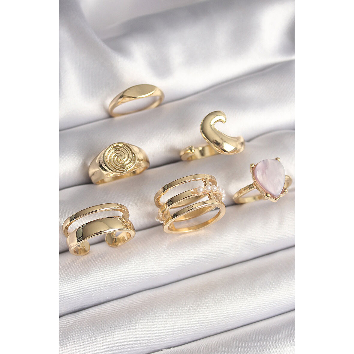 Pirinç Gold Renk Pembe Damla Mineli Sarmal İşleme Detaylı 6'Lı Kadın Yüzük Seti
