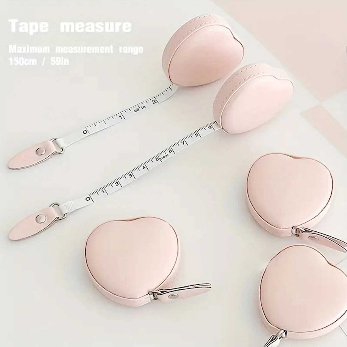 Kalp Şekilli Retraktable Mezura, Pembe, PU Deri, 6cm x 1.5cm, Otomatik Geri Sarmalı, Çift Sistemli, Taşınabilir