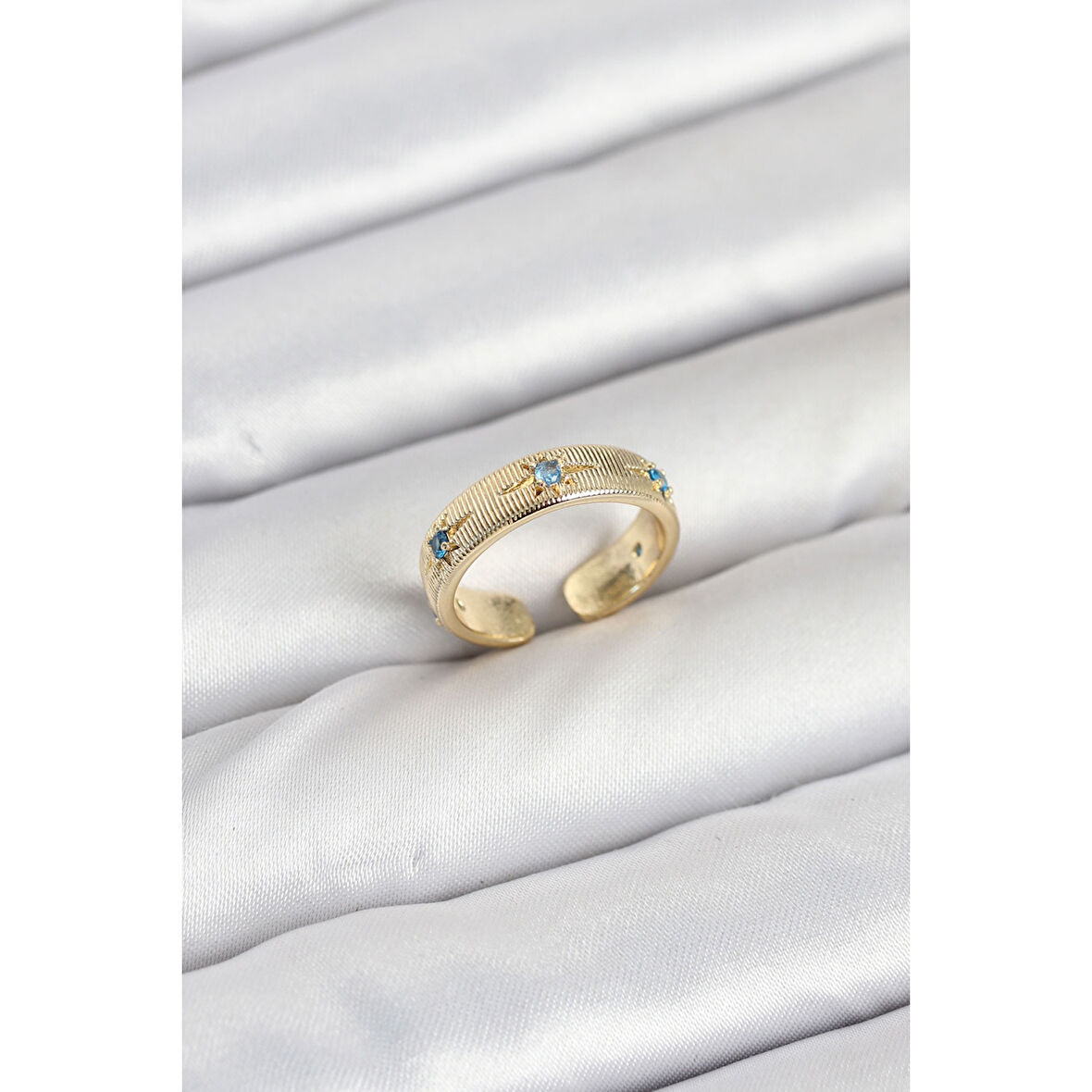 Pirinç Gold Renk Mavi Zirkon Taşlı Kutup Yıldızı Model Kadın Yüzük