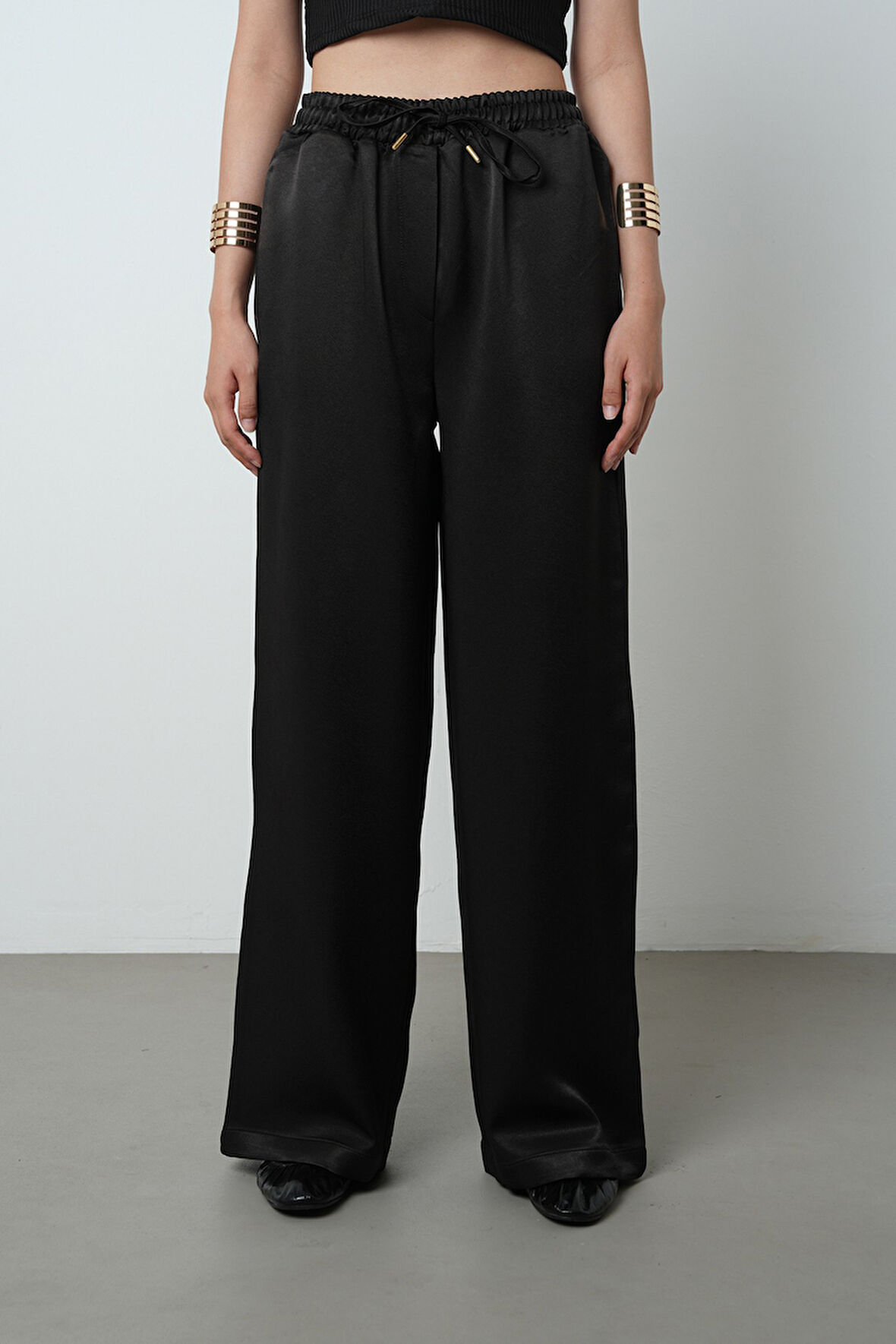 Kadın Düz Renk Parlak Kumaş Bol Paça Beli Lastikli Pantolon