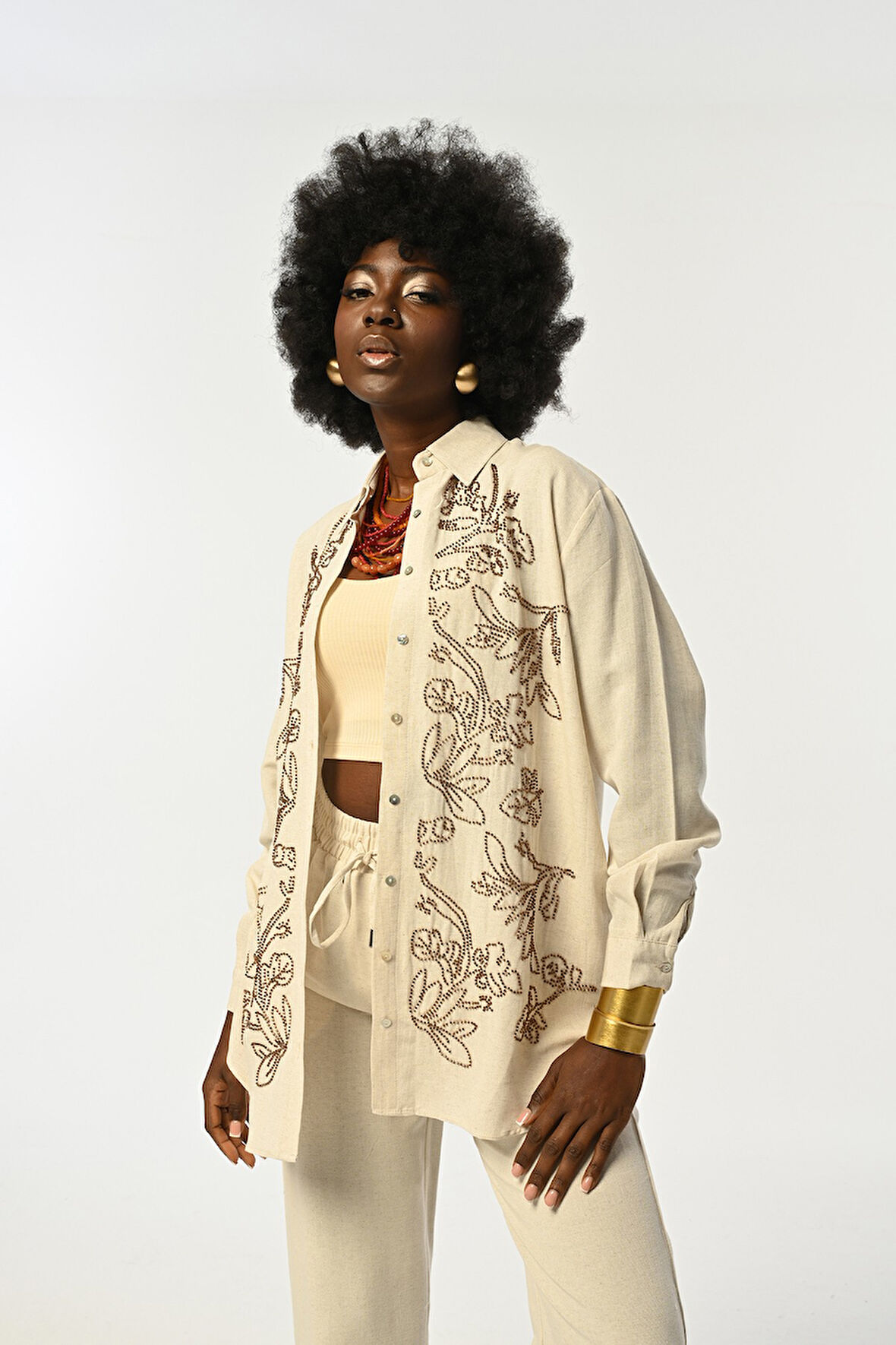 KADIN ÖNÜ BONCUK İŞLEMELİ OVERSİZE KESİM GÖMLEK