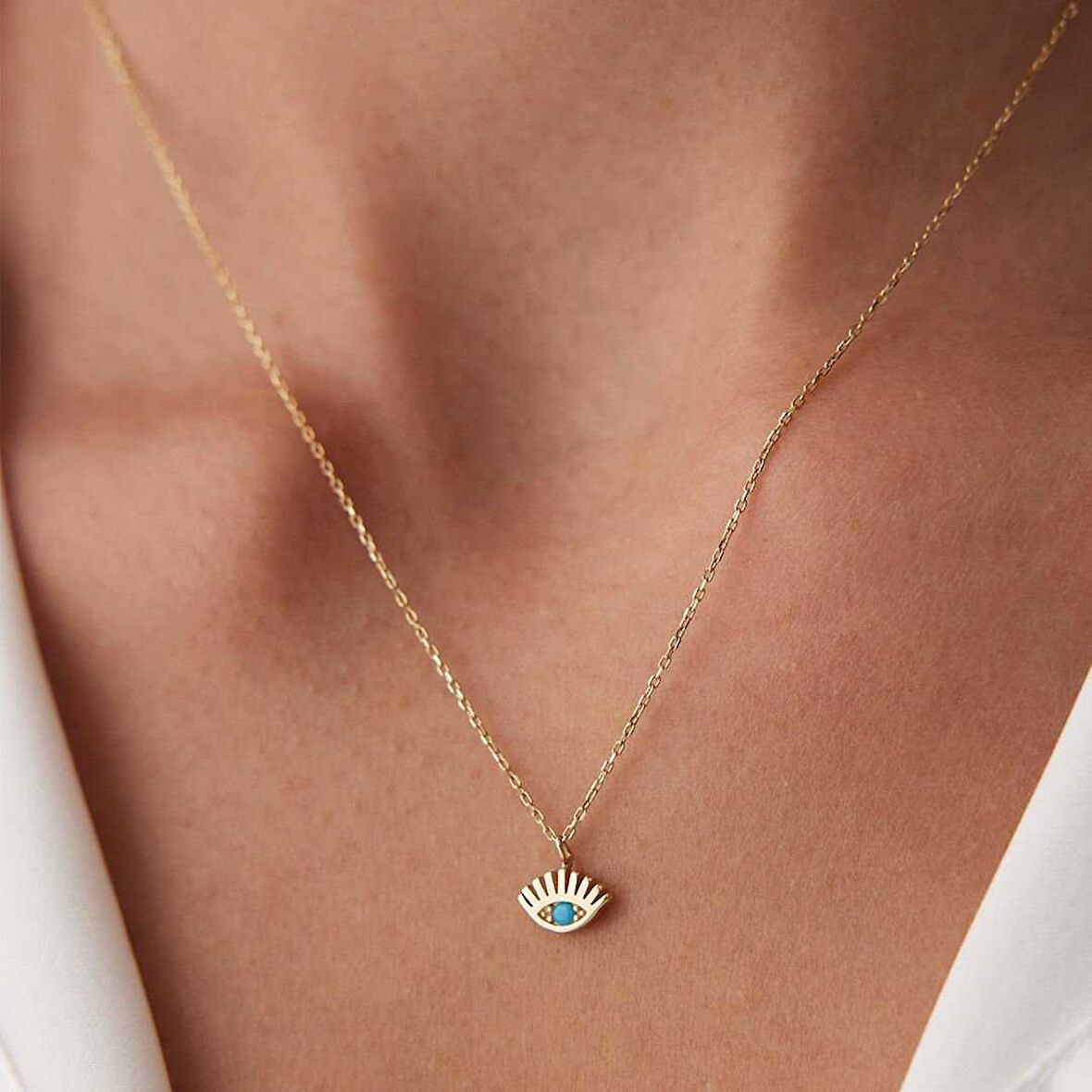 Üst Kirpik Mavi Taşlı Kolye