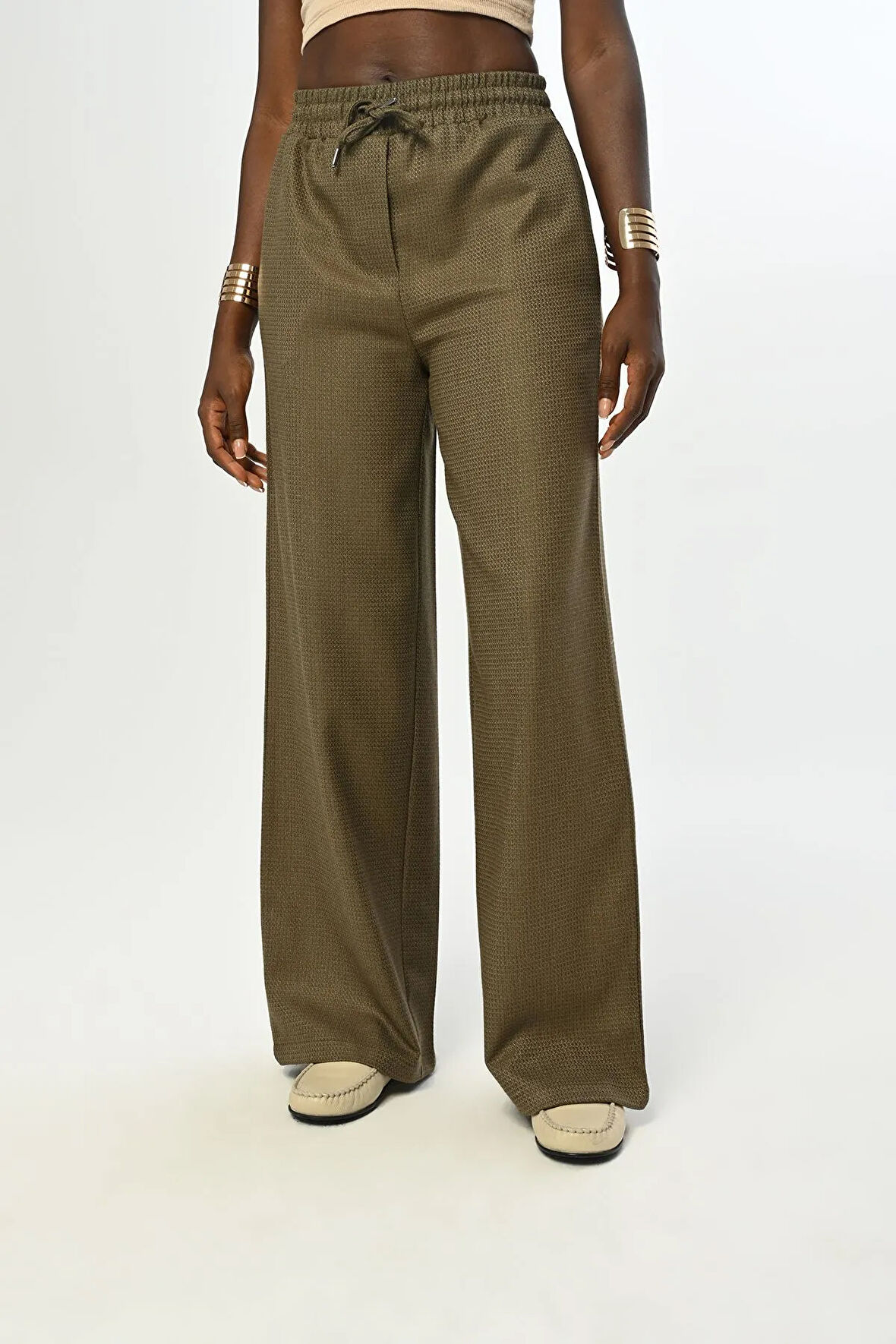 KADIN BELİ LASTİKLİ BOL PAÇA SİMLİ DÜZ RENK PANTOLON