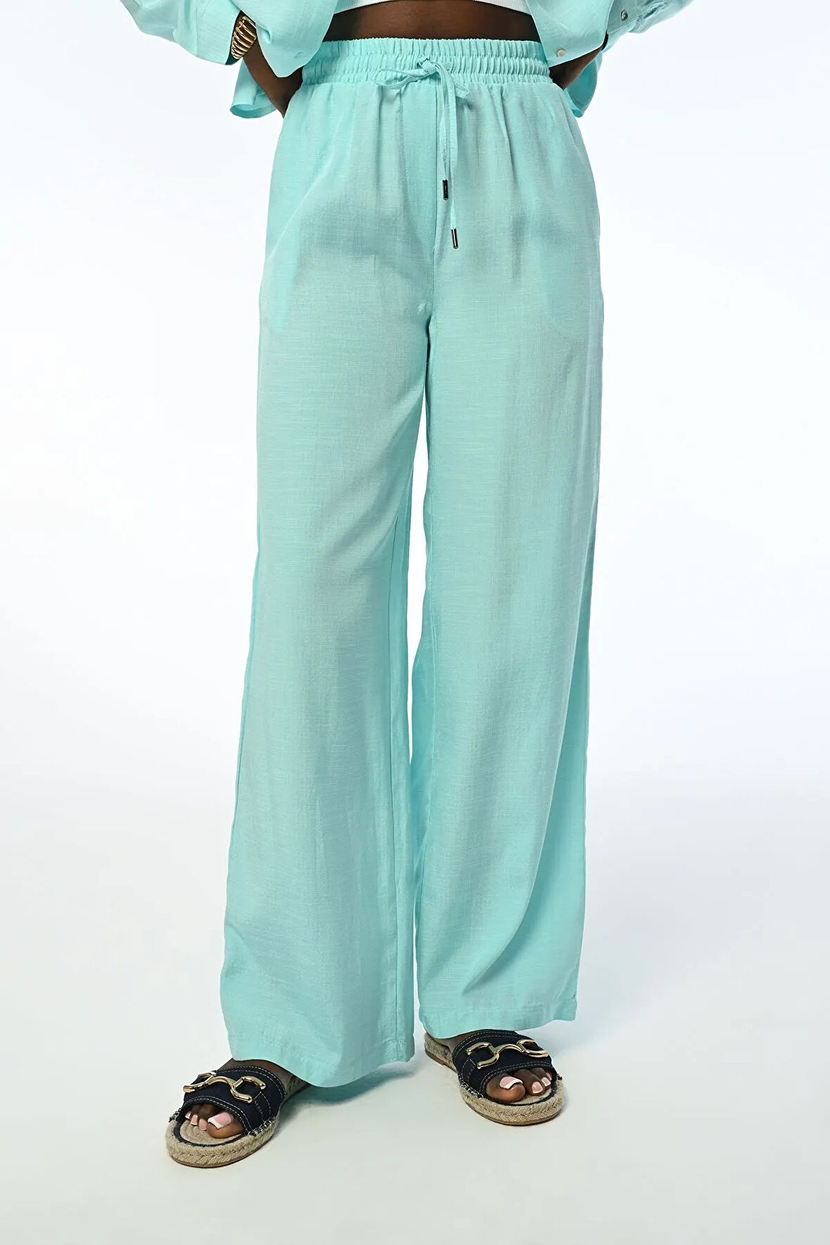 KADIN BELİ LASTİKLİ BOL PAÇA DÜZ RENK PANTOLON