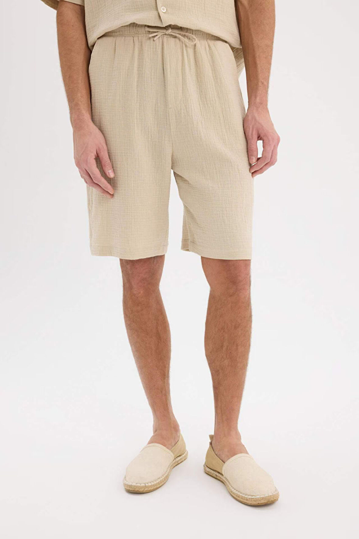 DeFacto %100 Pamuk Relax Fit Müslin Cepli Basic Düz Bermuda Şort C7589AX25SMBG695