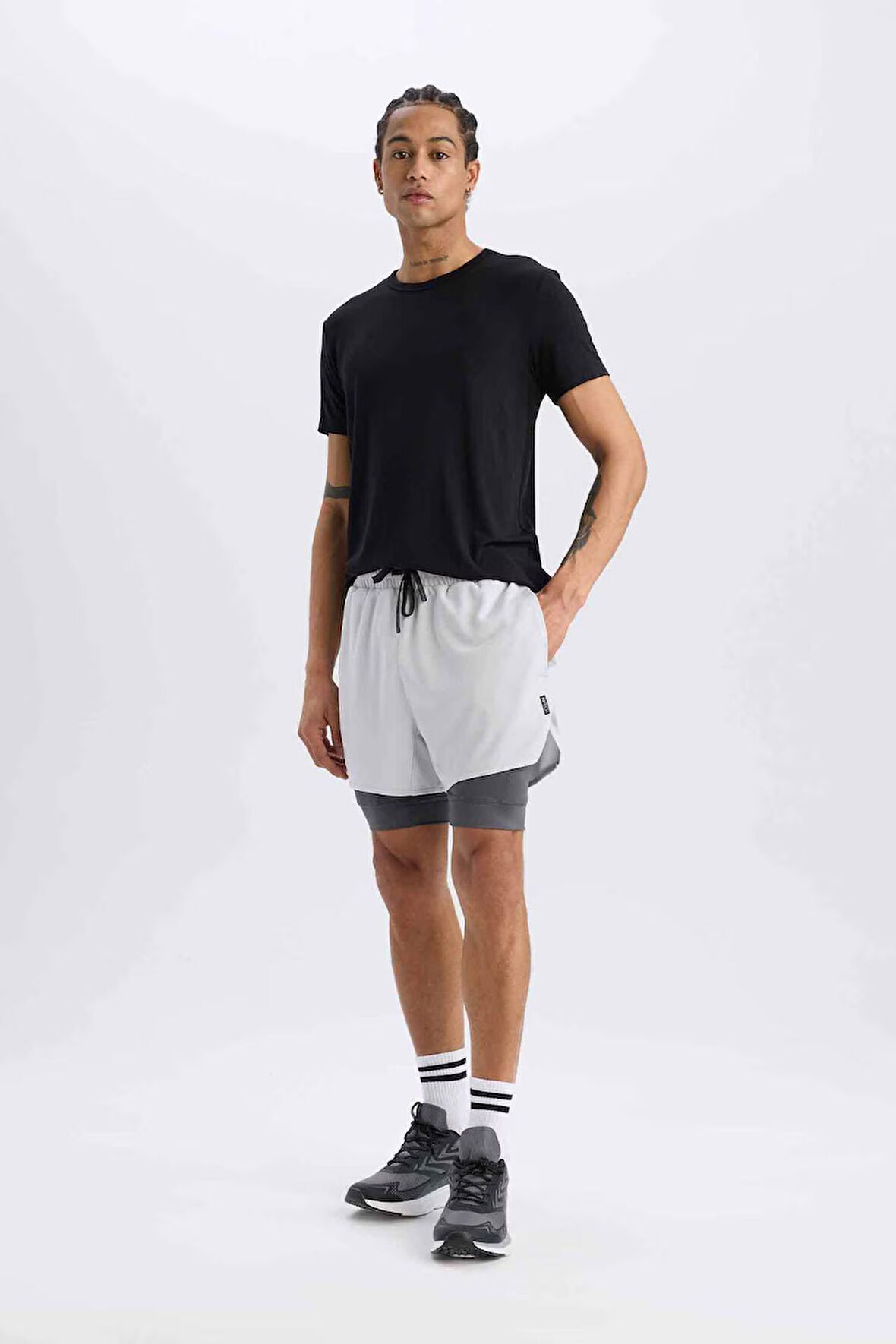 DeFactoFit Slim Fit Dar Kesim Sporcu Penye Taytlı Şort