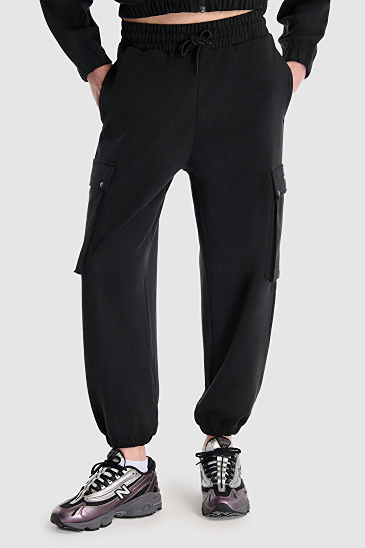 New Balance Lifestyle WNP1529-BK Siyah Kadın Eşofman Altı