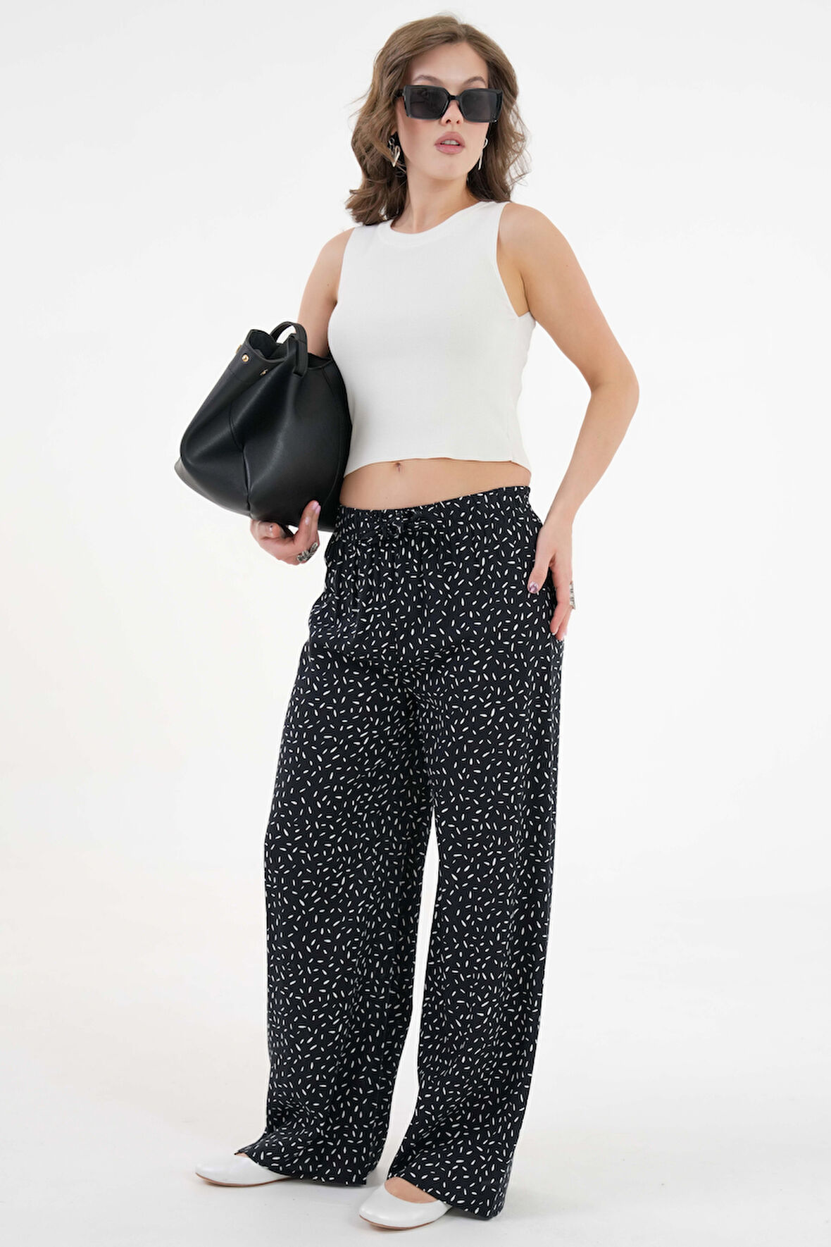 Siyah desenli Beli Lastikli Bağlamalı Bol Paça Dokuma Pantolon