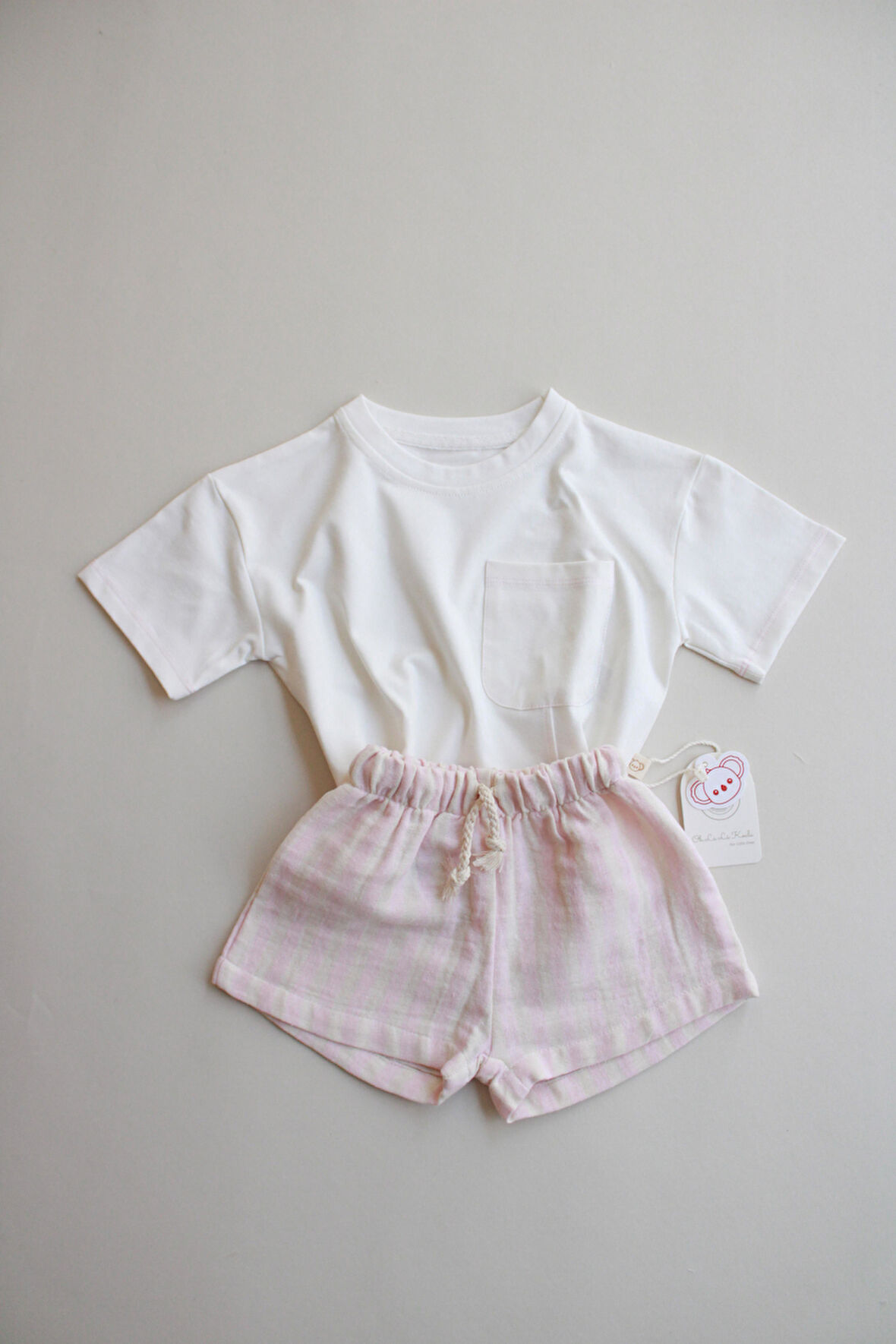 Pembe Kontrast Dikişli Asimetrik Şortlu Takım