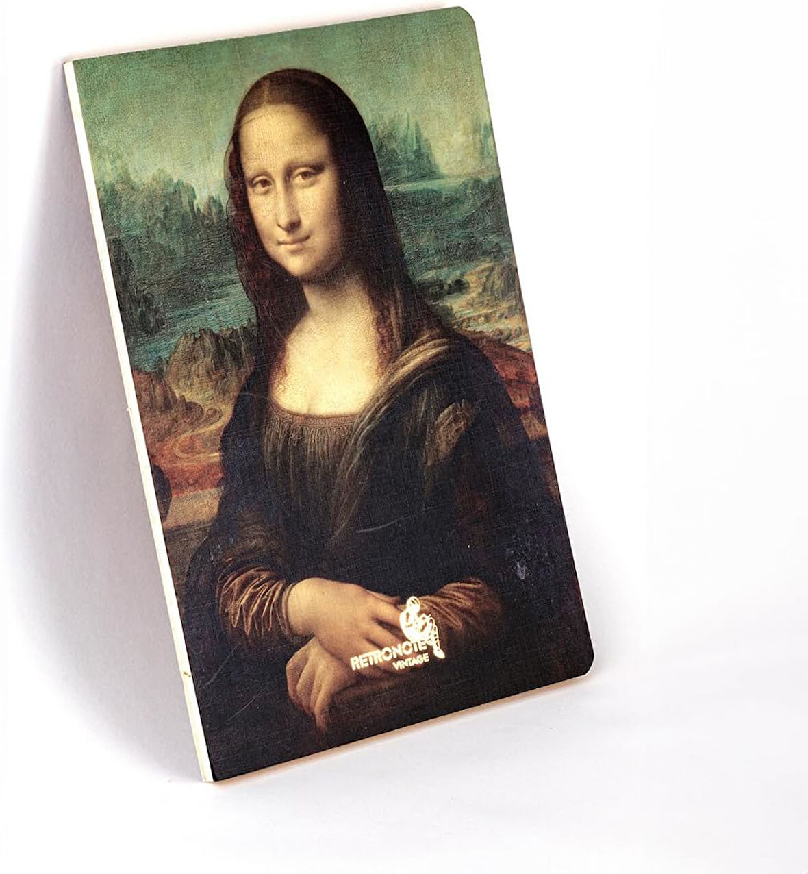 Mona Lisa, Da Vinci 1503-06, Vintage Defter IV, Çizgisiz, 96 Sayfa, İplik Dikiş, Esnek Kapak, Yaldızlı Oval Kenar, Tuval Doku, 90 gram, Fildişi Renk, 14,8x21x1cm
