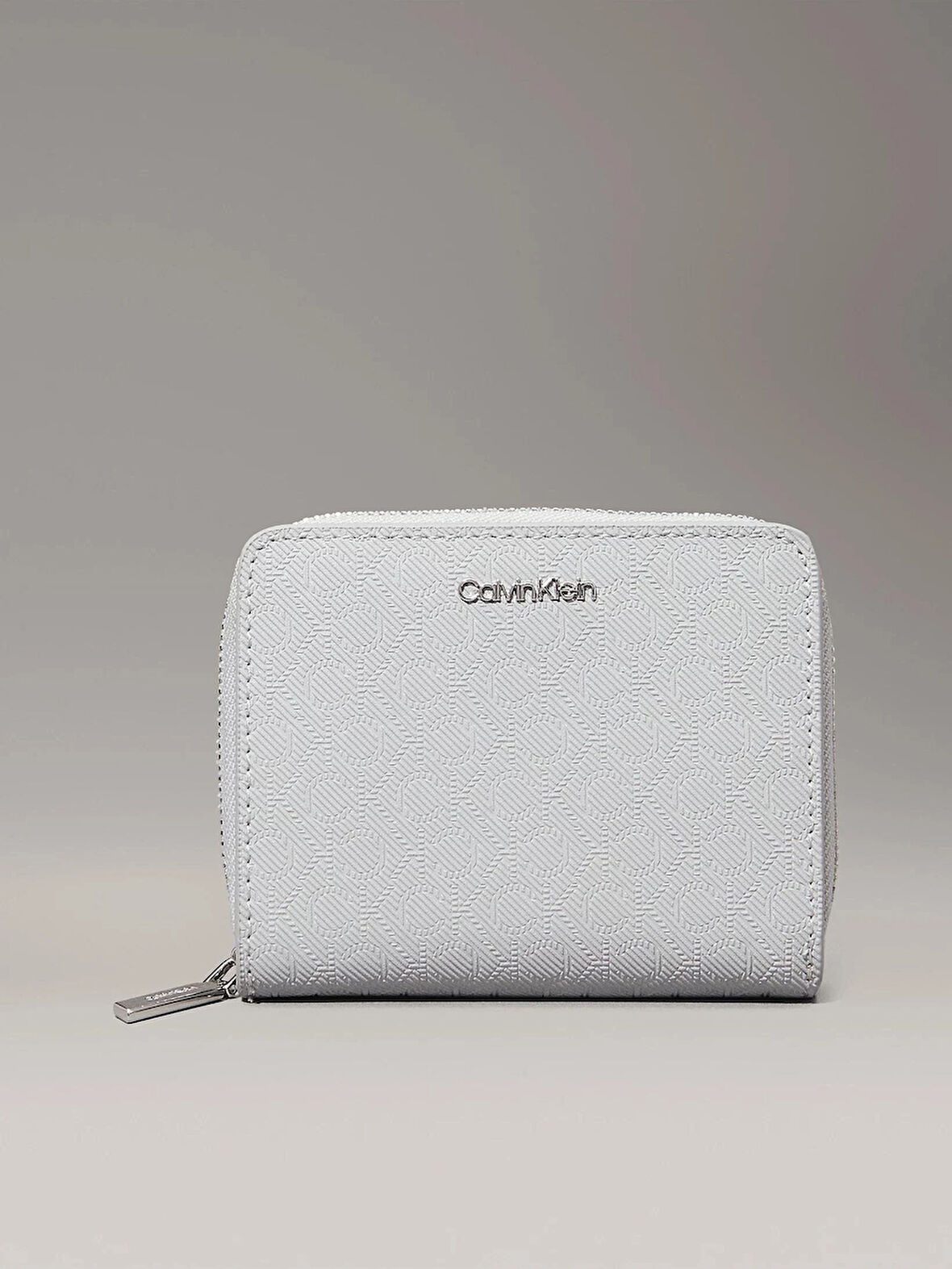 CK MUST MEDIUM ZIP AROUND_MONO