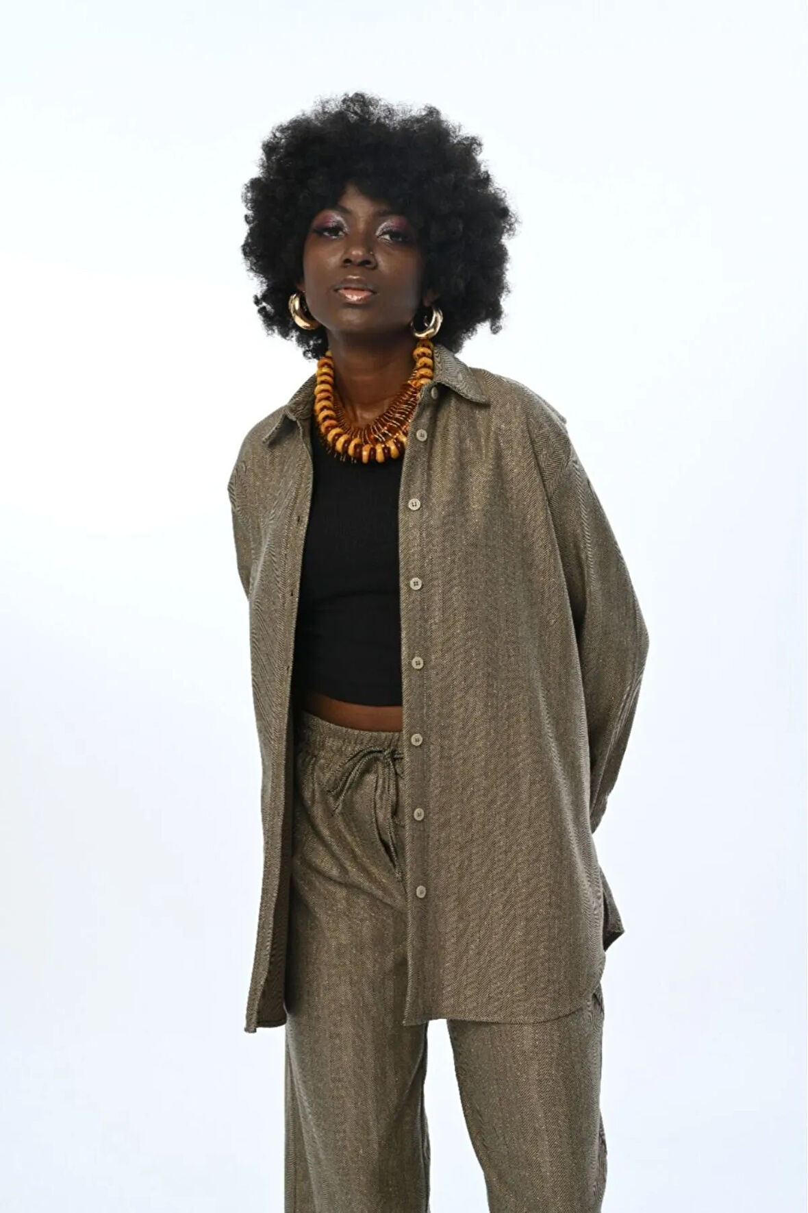 KADIN İNCE ÇİZGİLİ SİMLİ OVERSİZE KESİM GÖMLEK