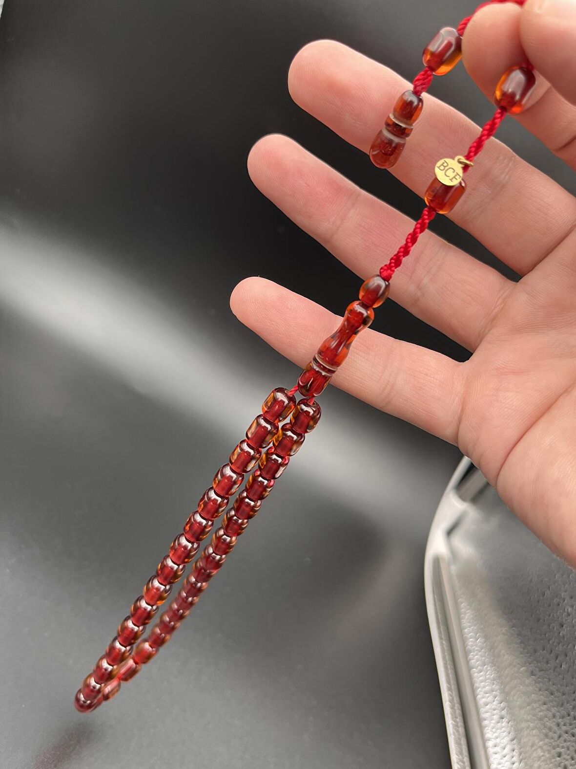 Koyu Sarı Ateş Kehribar 33 Taneli Sistem Püskül Dahil 27 cm Kapsül Kesim Küçük Boy Tesbih
