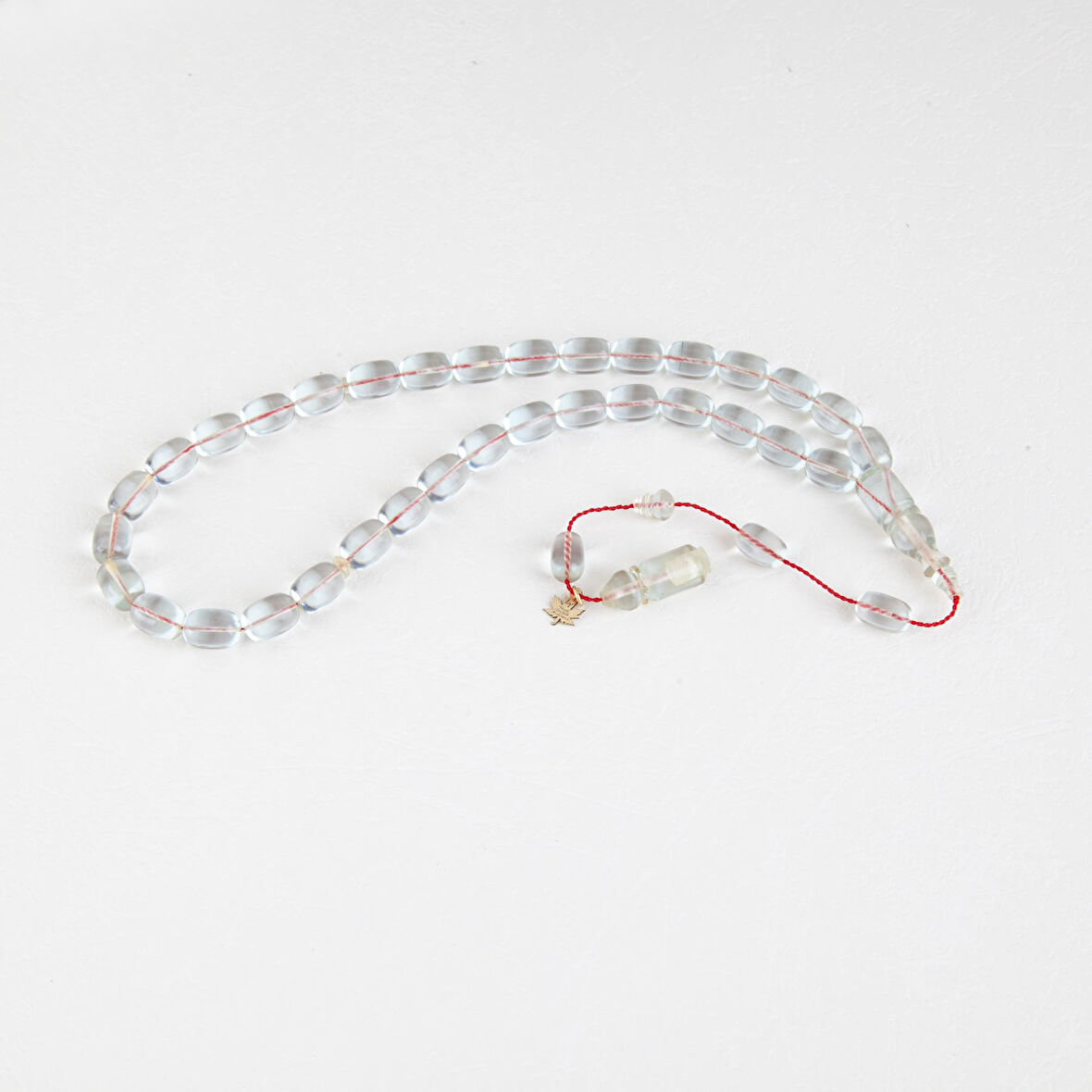 Ateş Kehribar Beyzi Kesim 7.5x11mm Tesbih - Şeffaf Beyaz