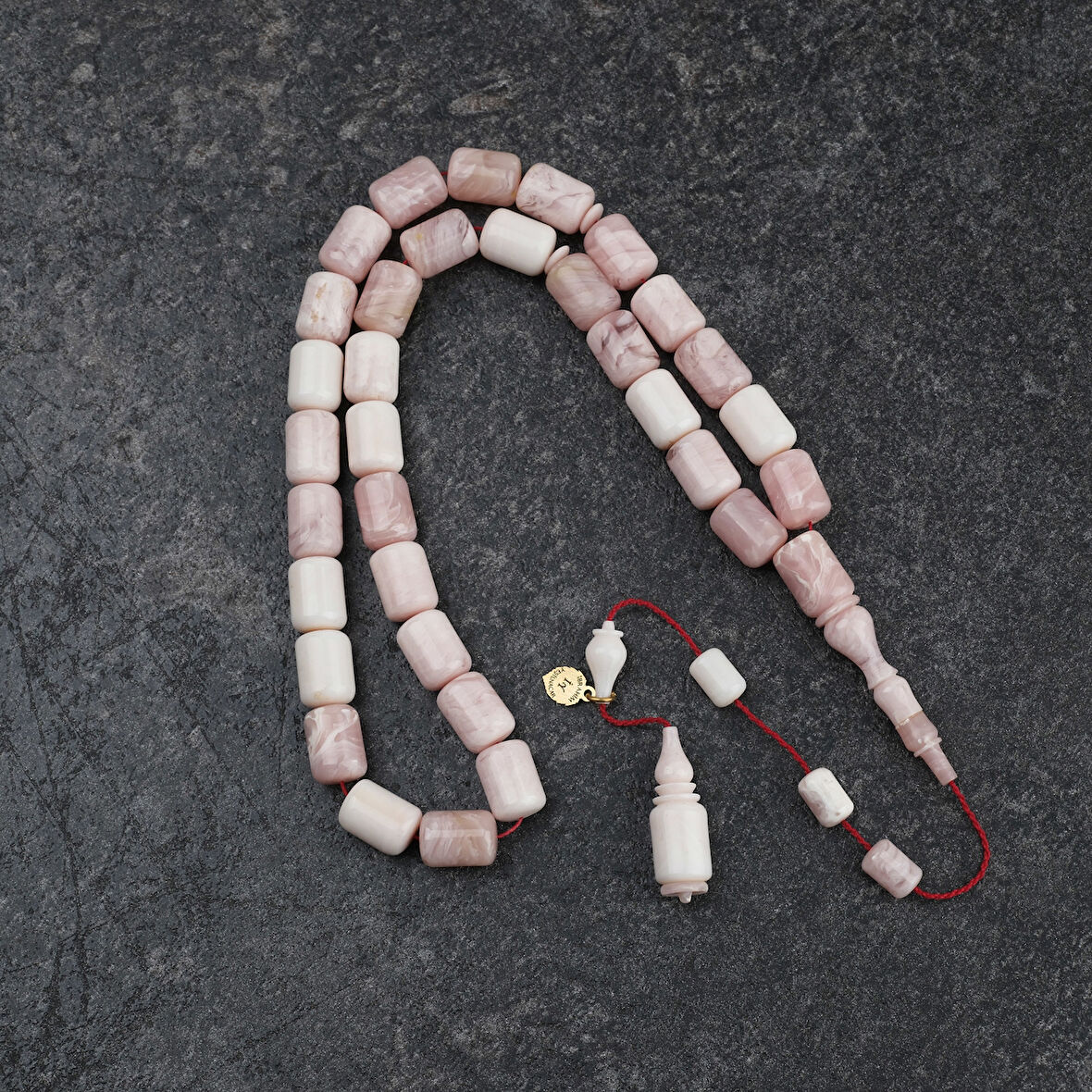 Katalin Dinlenmiş Çubuk Usta işi İmzalı Kapsül Kesim 9x12mm Tesbih -Beyaz Alacalı