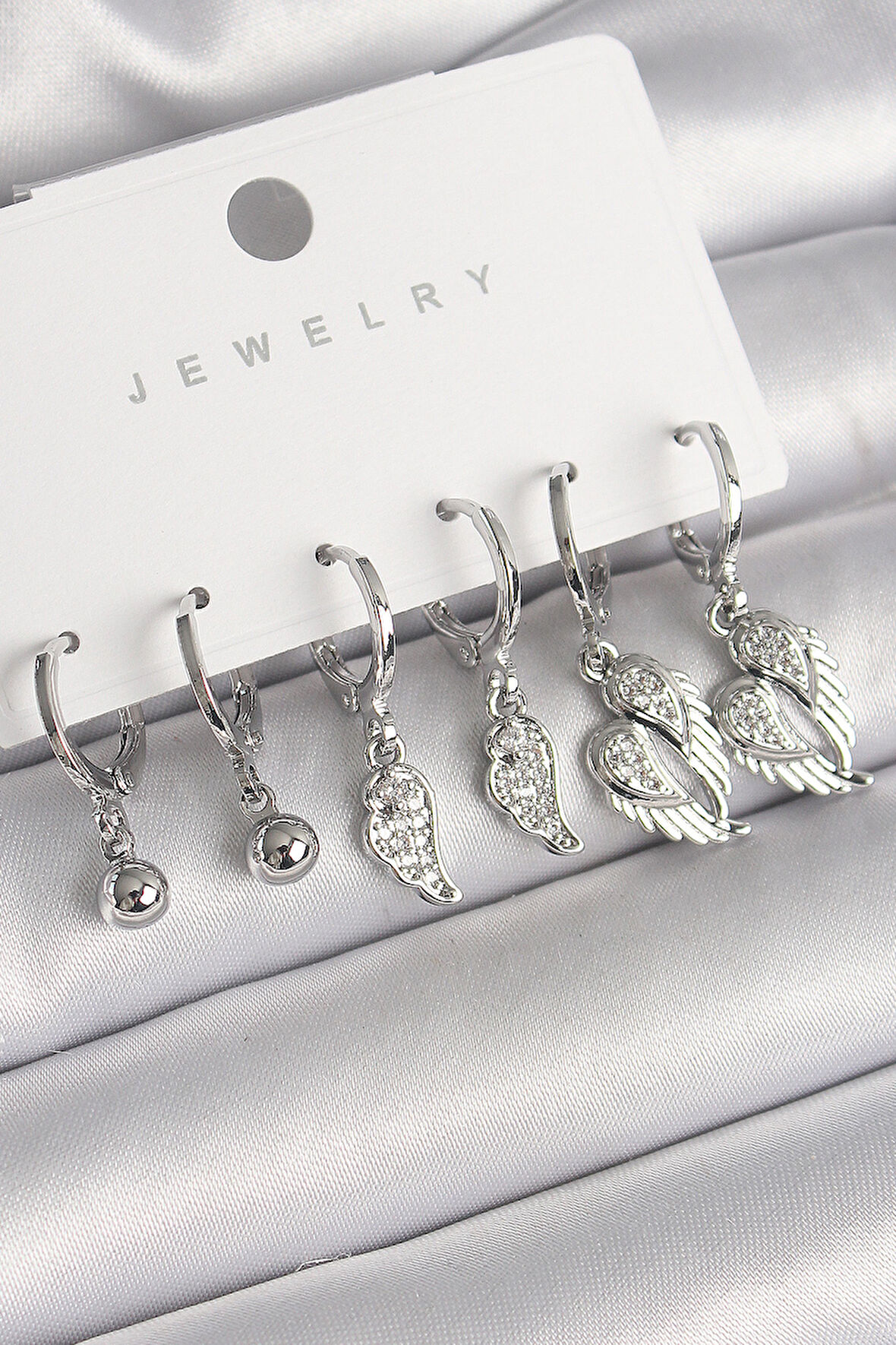 Pirinç Gümüş Renk Sallantı Zirkon Taşlı Kanat Model Topçuk Detay Kadın Küpe Seti - TJ-BKP10285