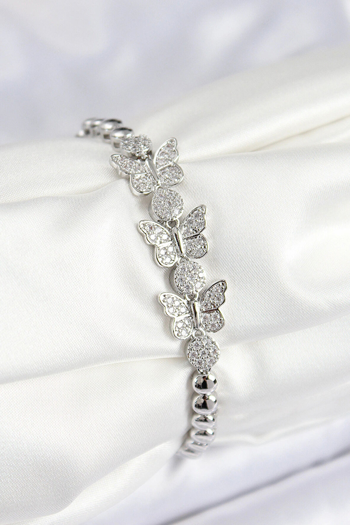 Dodes Dodes Pirinç Zirkon Taşlı Kelebek Model Gümüş Renk Kadın Bileklik TG27BB7892