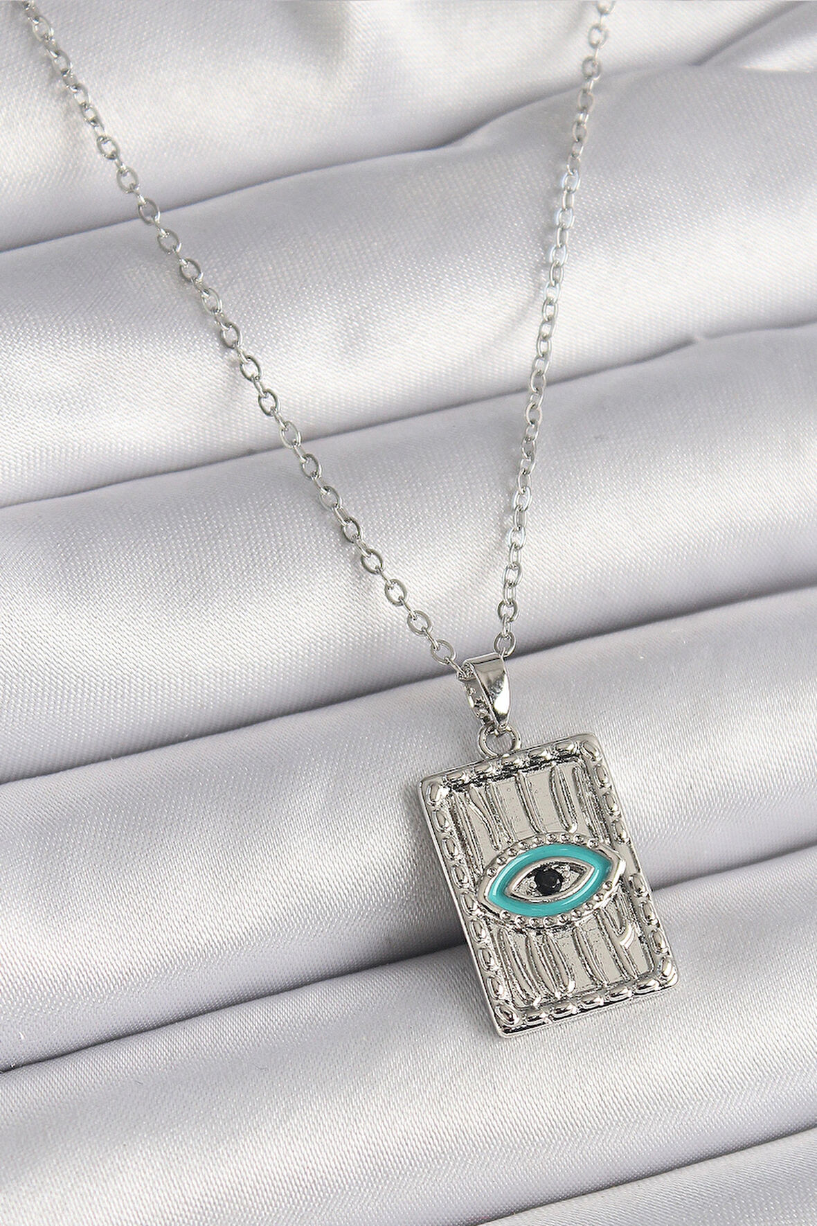 Dodes Dodes 316L Çelik Gümüş Renk Zirkon Taşlı Göz İşleme Detaylı Plaka Model Kadın Kolye TG27BKO9616