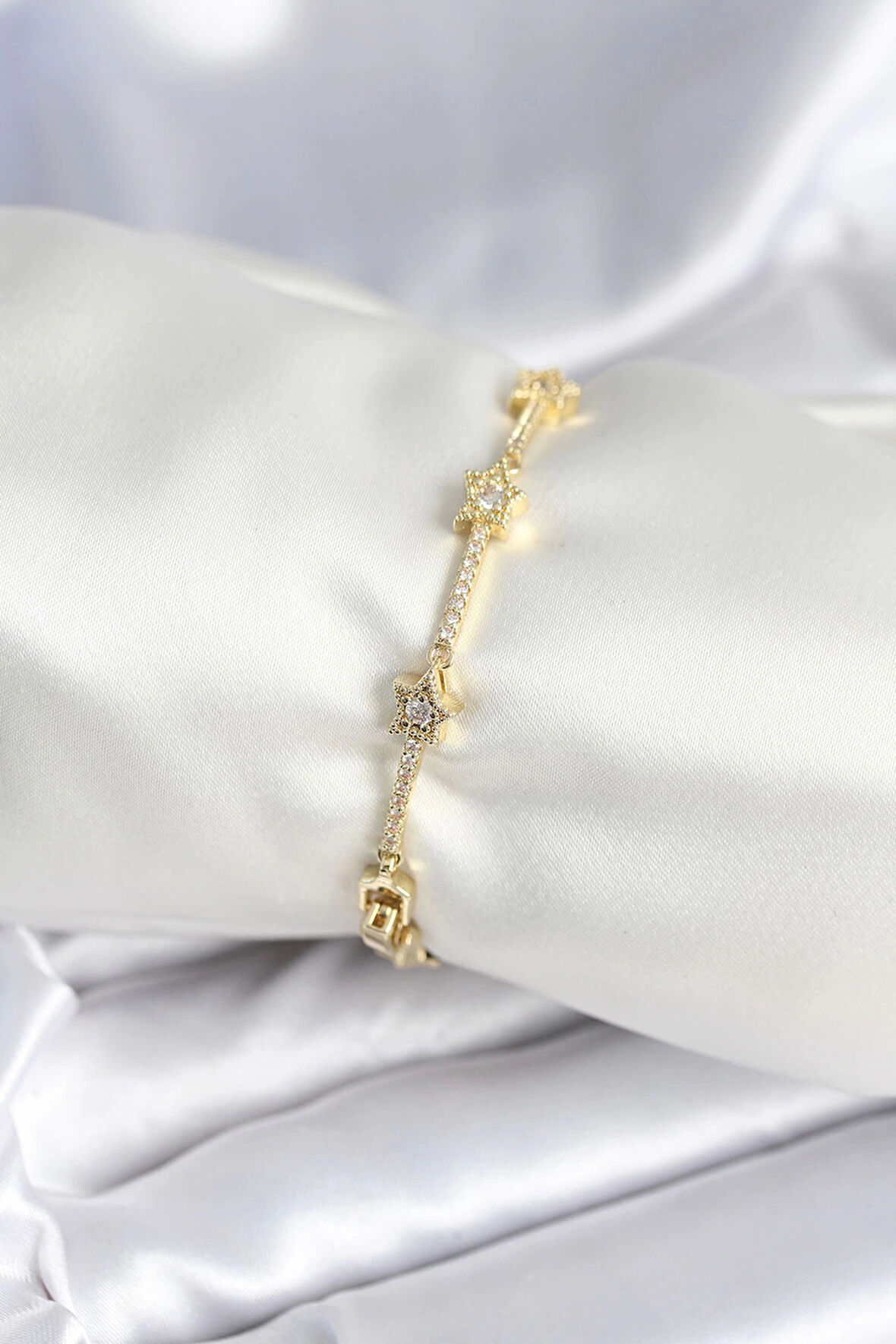 Dodes Pirinç Gold Renk Halley Yıldız Model Kadın Bileklik TG27BB7984