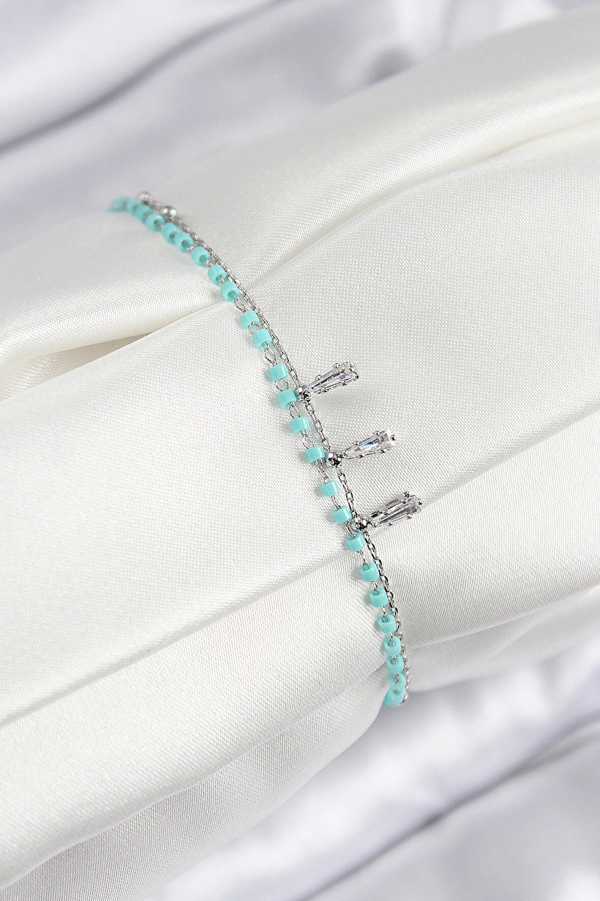 Dodes Dodes Pirinç Zirkon Taşlı Mavi Boncuklu Model Gümüş Renk Kadın Bileklik TG27BB7582