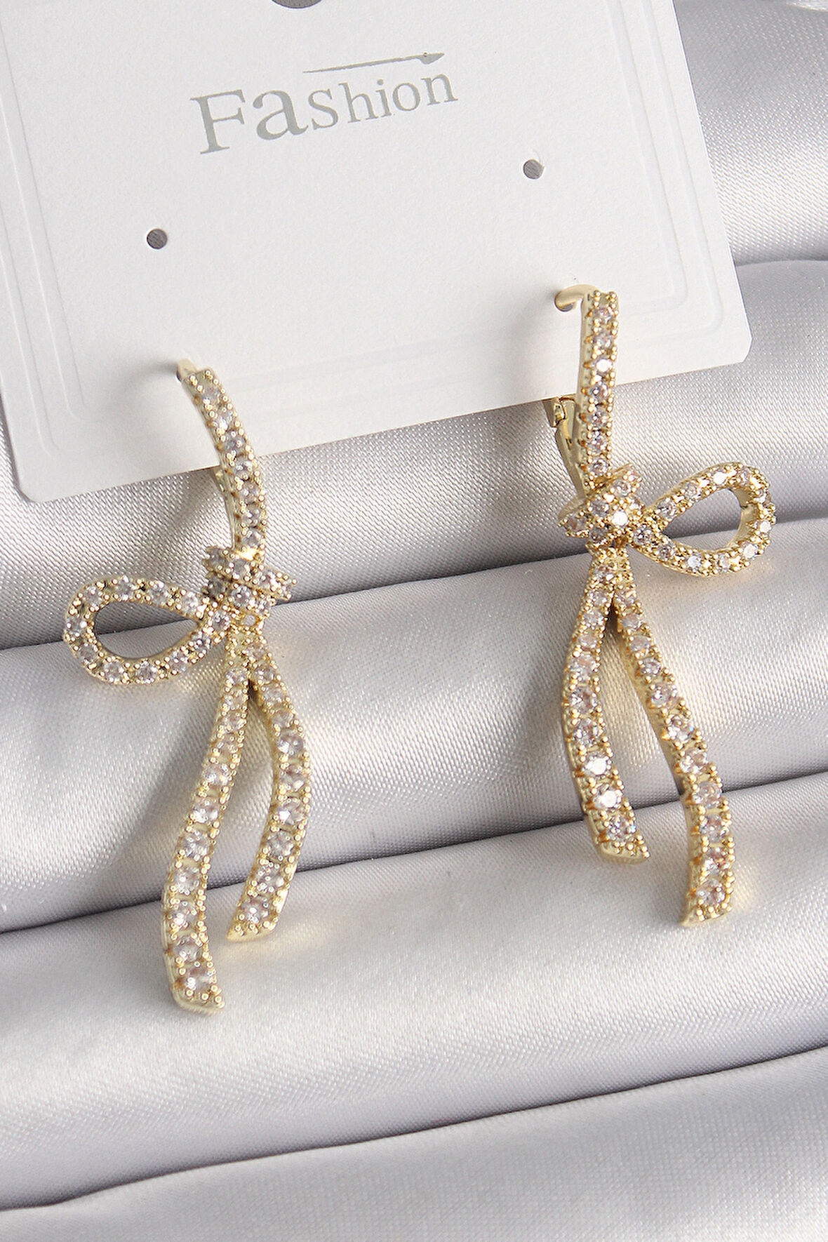 Pirinç Gold Renk Zirkon Taşlı Kurdele Model Kadın Küpe - EBJ241228W30198